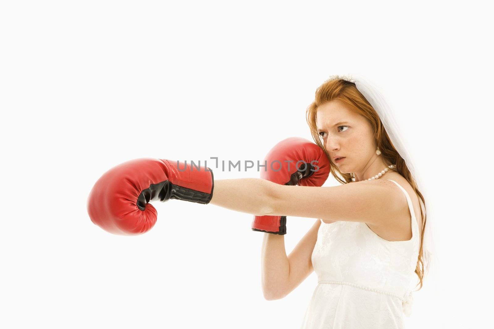 Caucasian bride with boxing gloves.