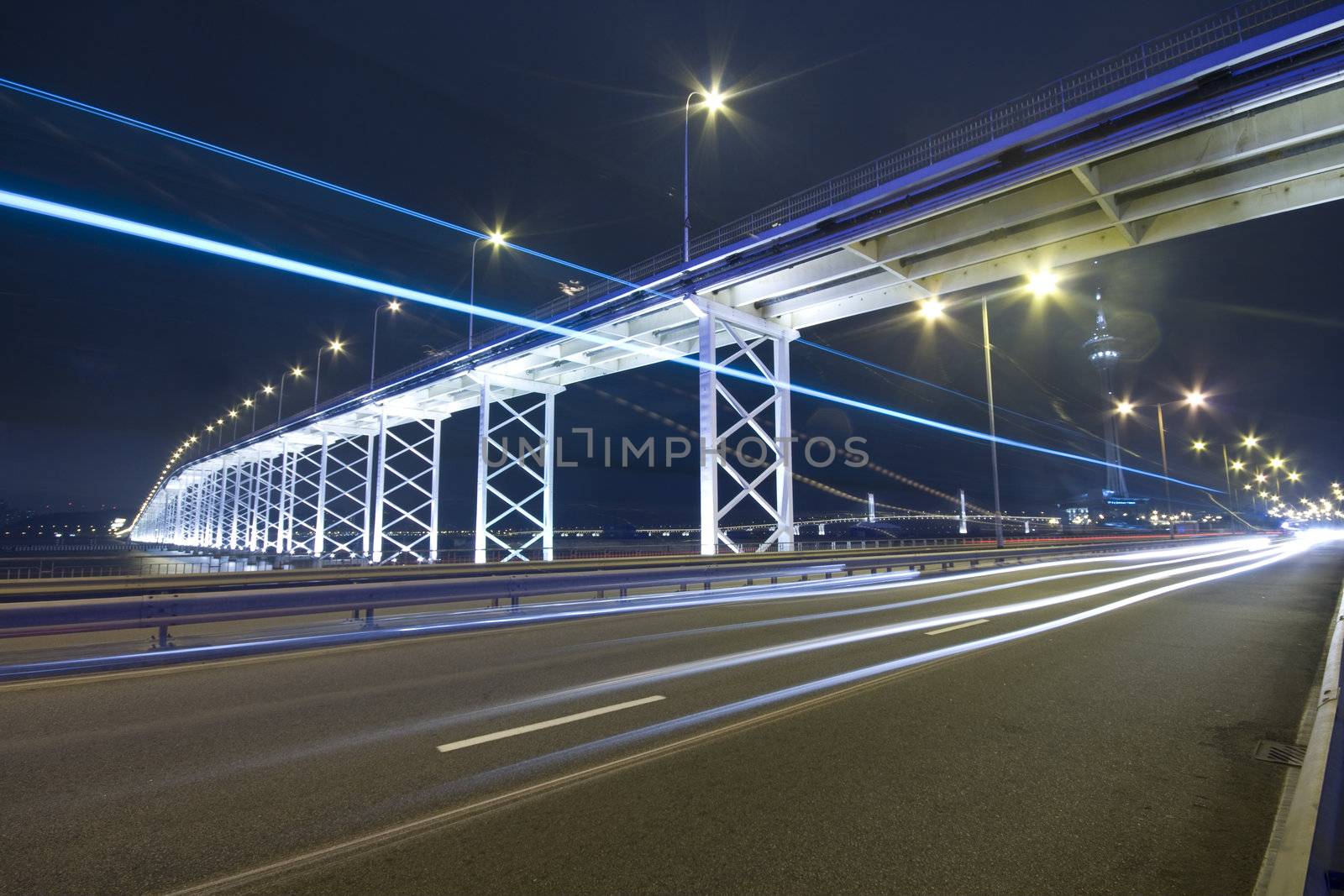 highway under the bridge in macau by cozyta