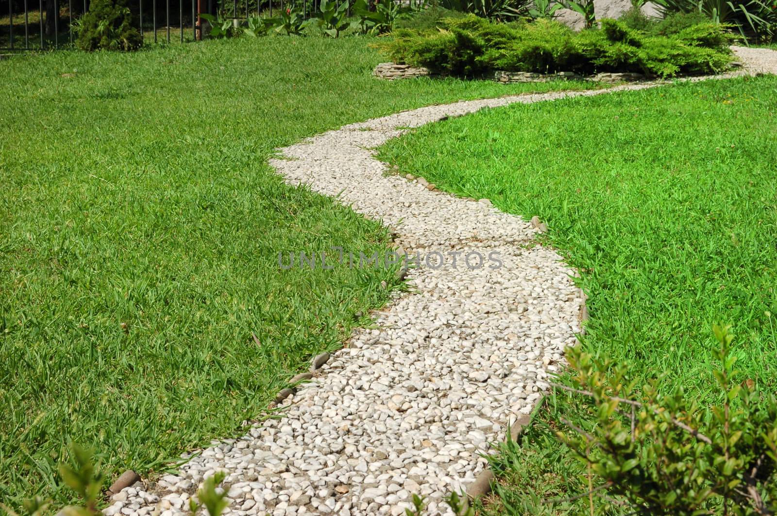 close-up of garden footway of stones of white color