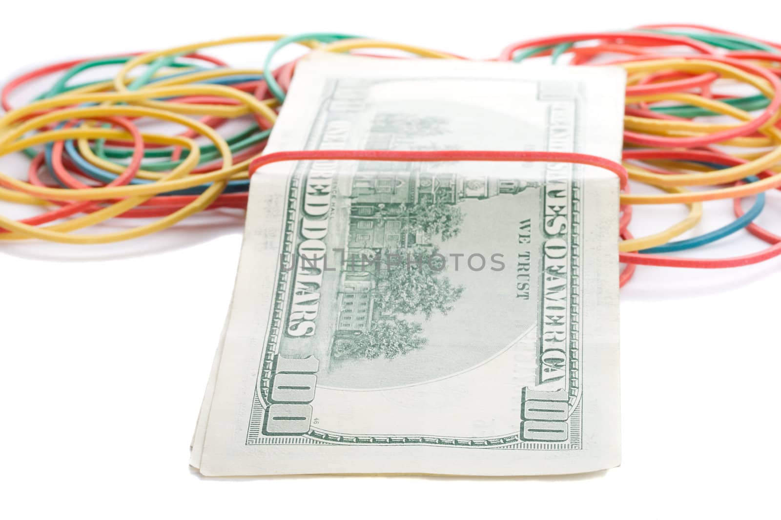concept last dollars in desk, few dollars and many empty rubber band, isolated on white