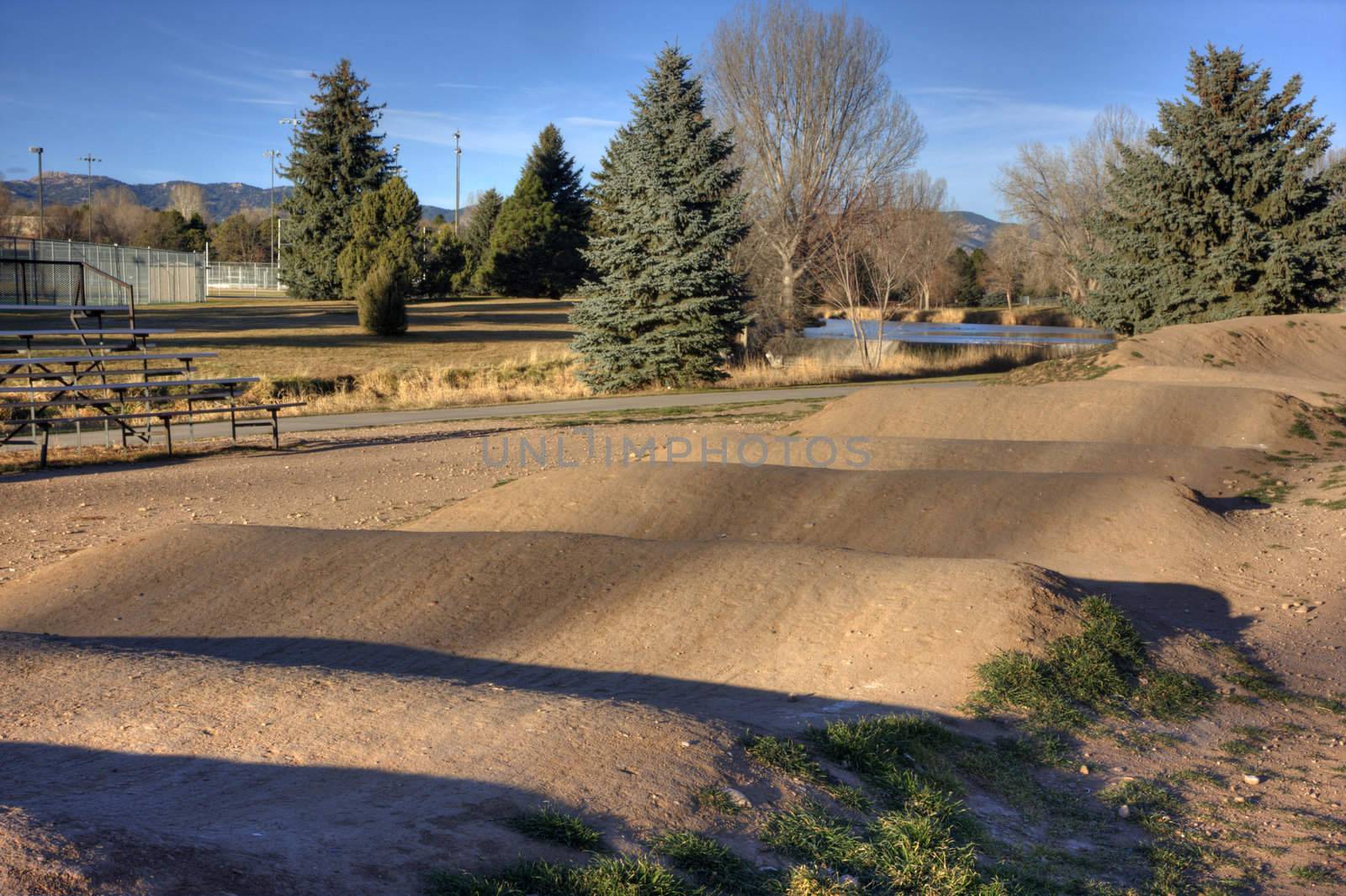racing  BMX track in Edora Park, Fort Collins, Colorado, walking trail, tennis courts and ball fields in a background