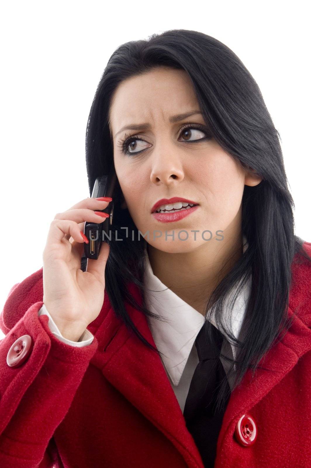 young female talking on cell phone against white background