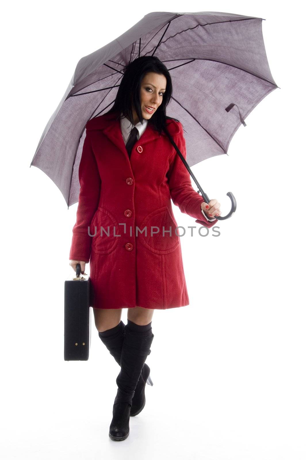 full body pose of caucasian female holding briefcase and umbrella with white background