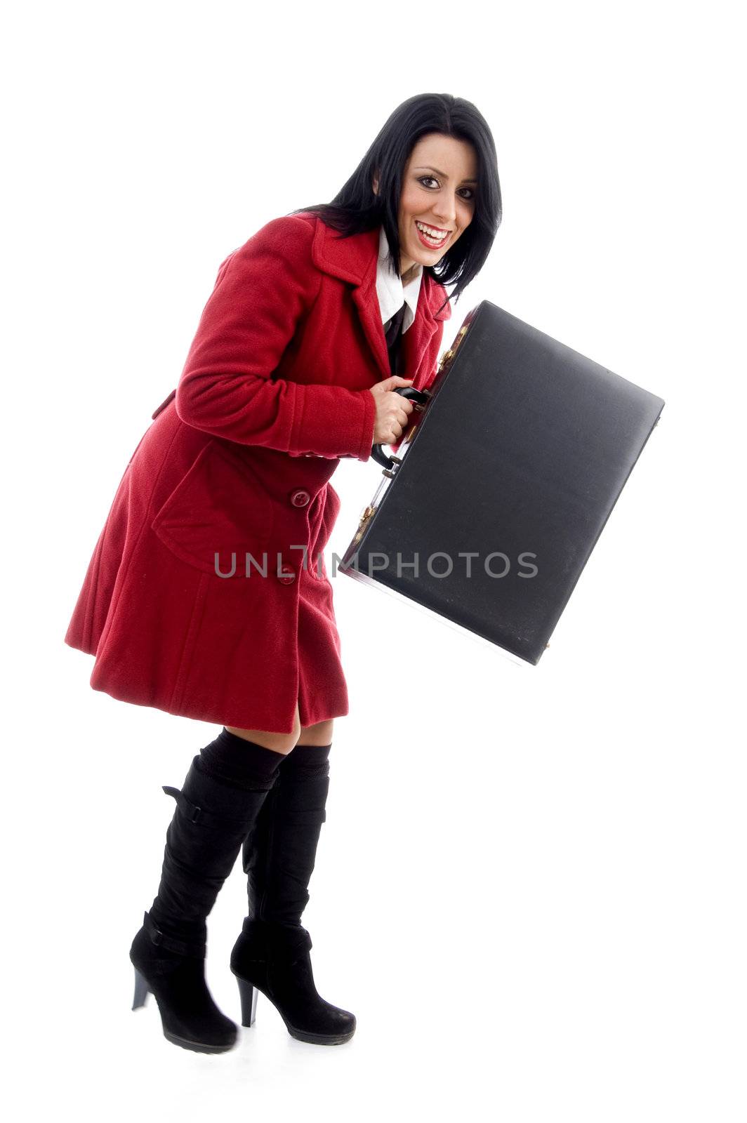 full body pose of young woman holding office bag against white background
