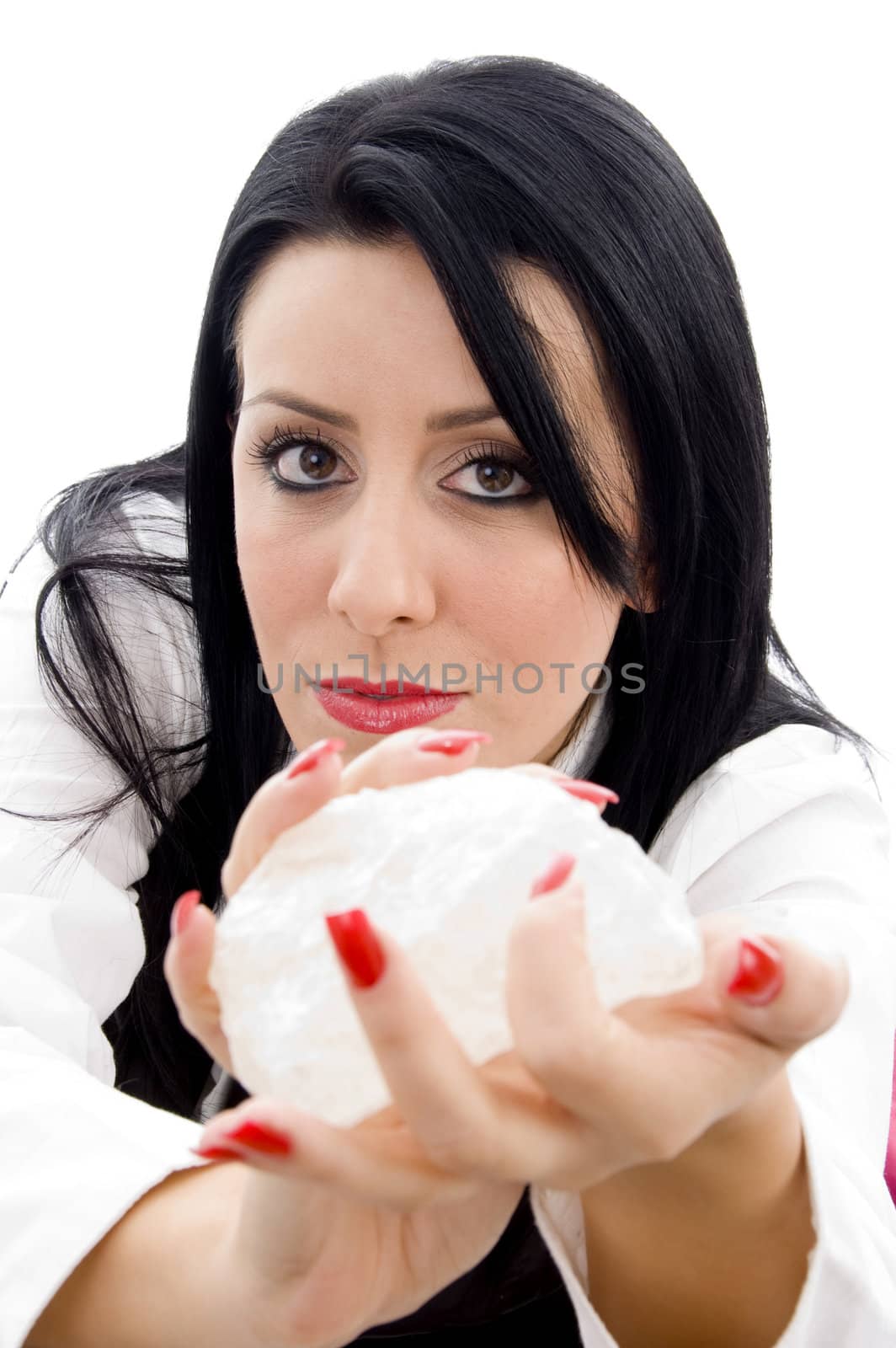 caucasian female holding a rock on an isolated background