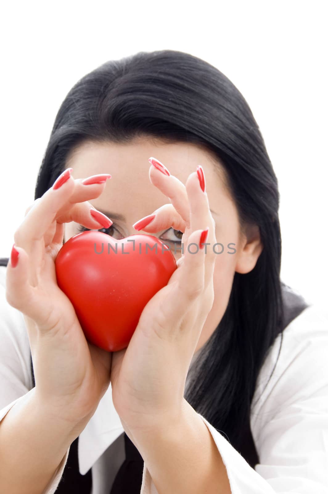 young woman holding a red heart  on an isolated white background