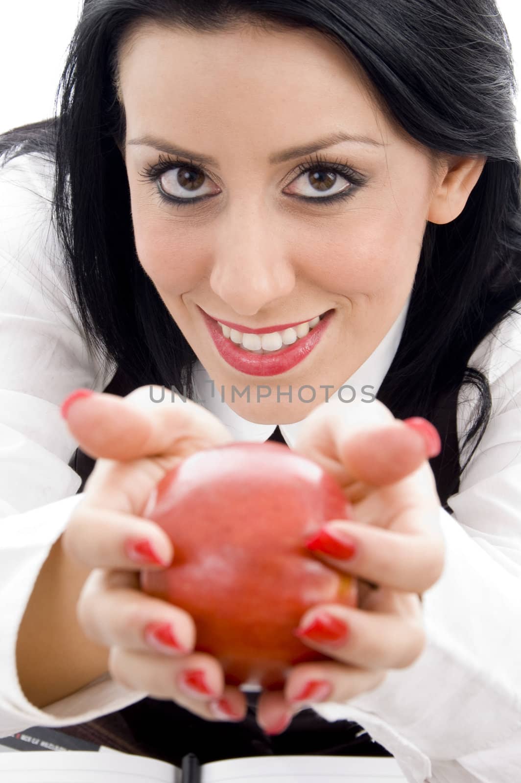 caucasian female holding an apple with white background