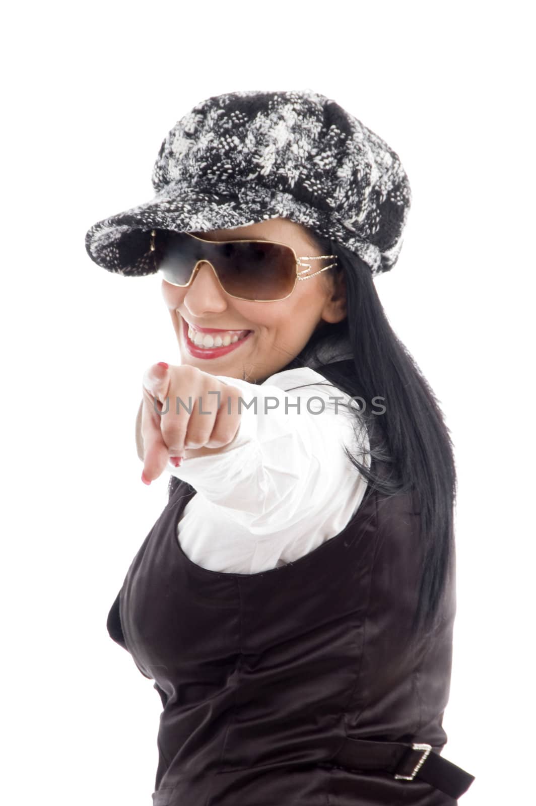 portrait of american woman pointing backwards with white background