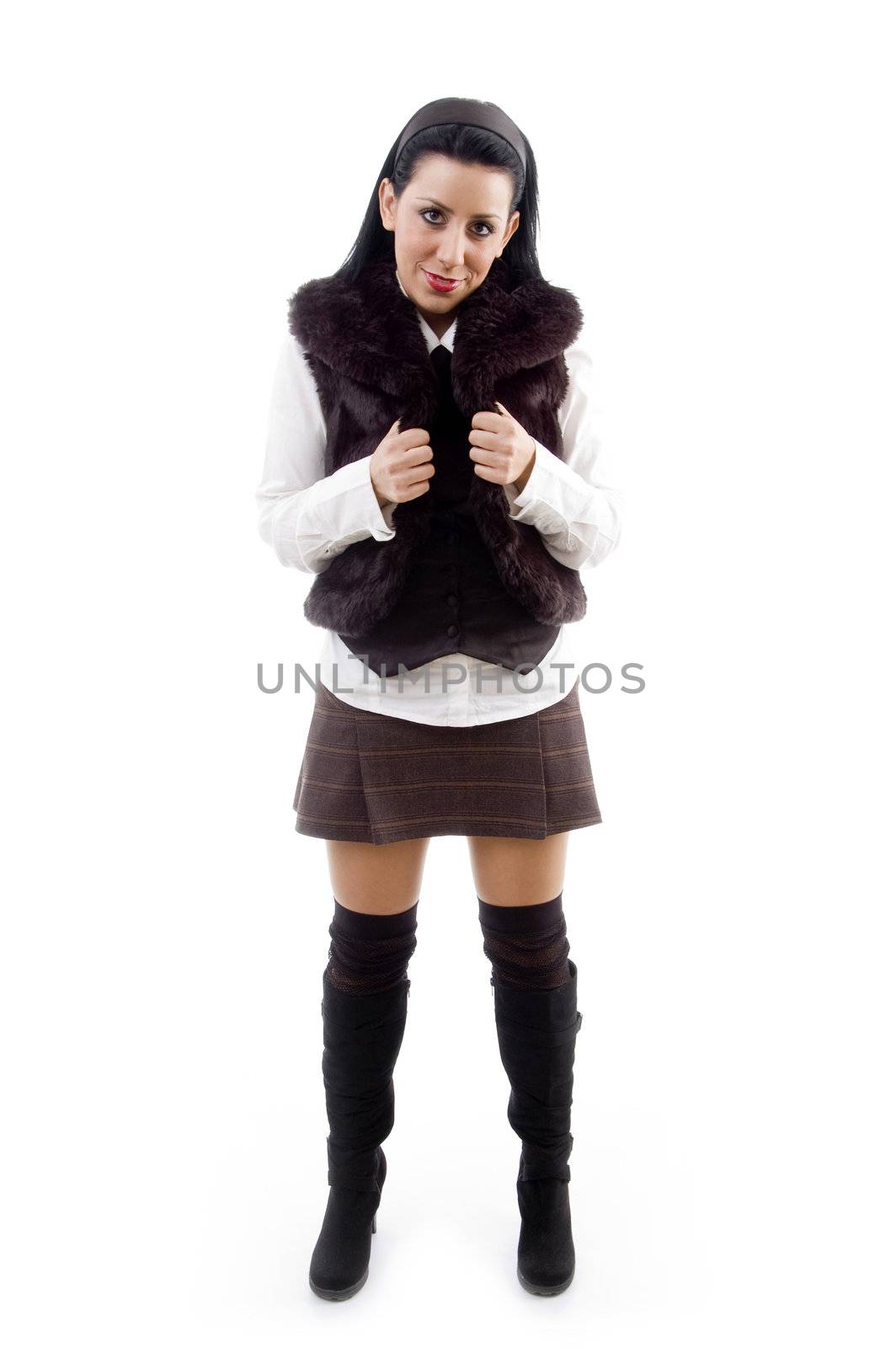 young female wearing jacket and skirt on an isolated white background