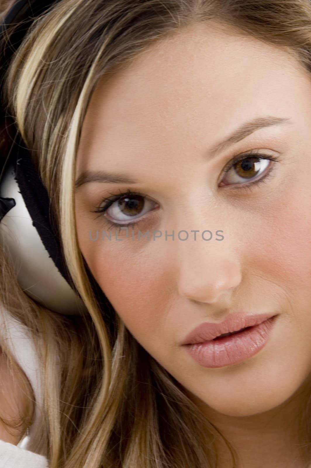 woman tuned in music with white background