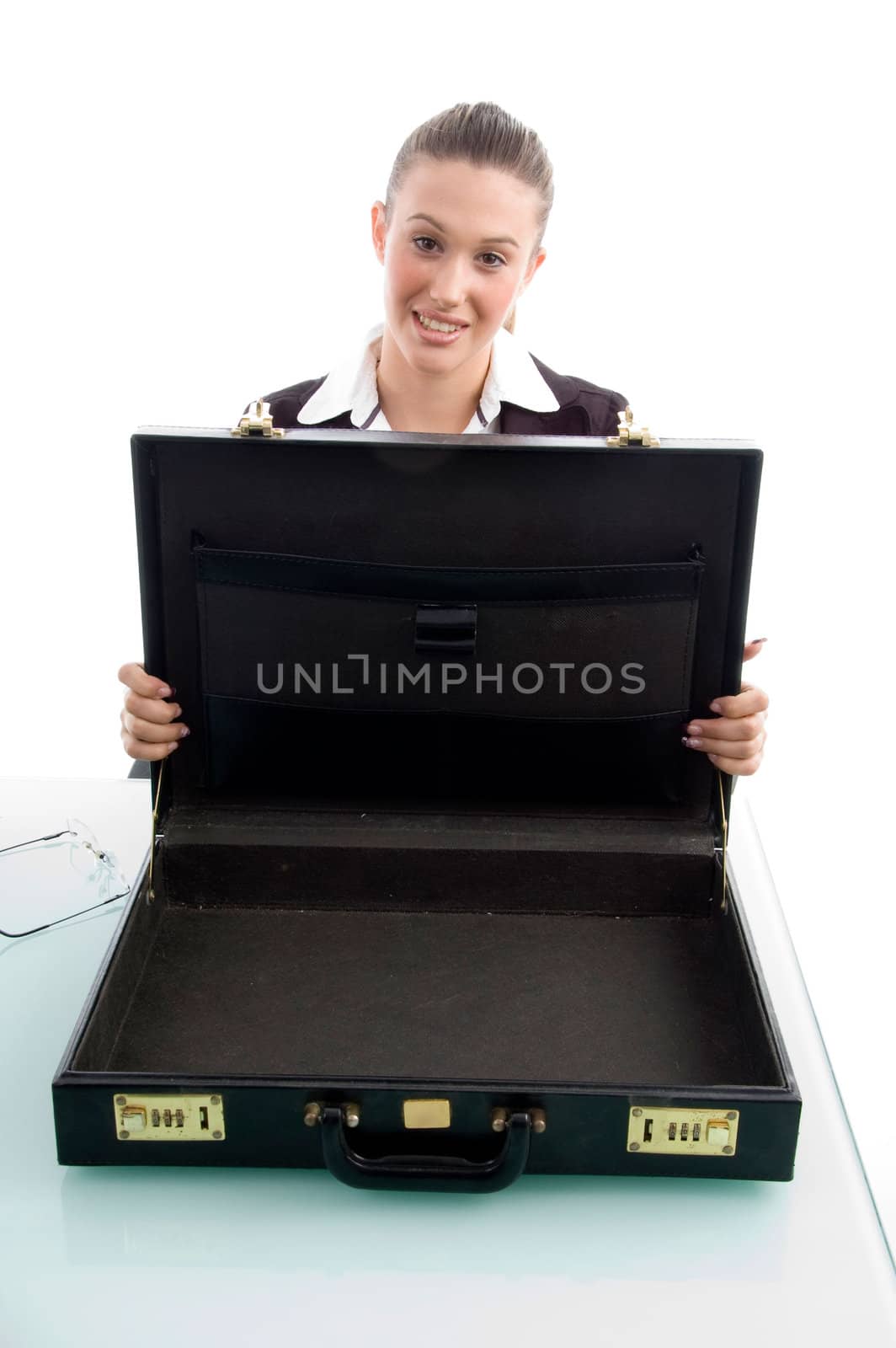 woman showing suitcase on an isolated background