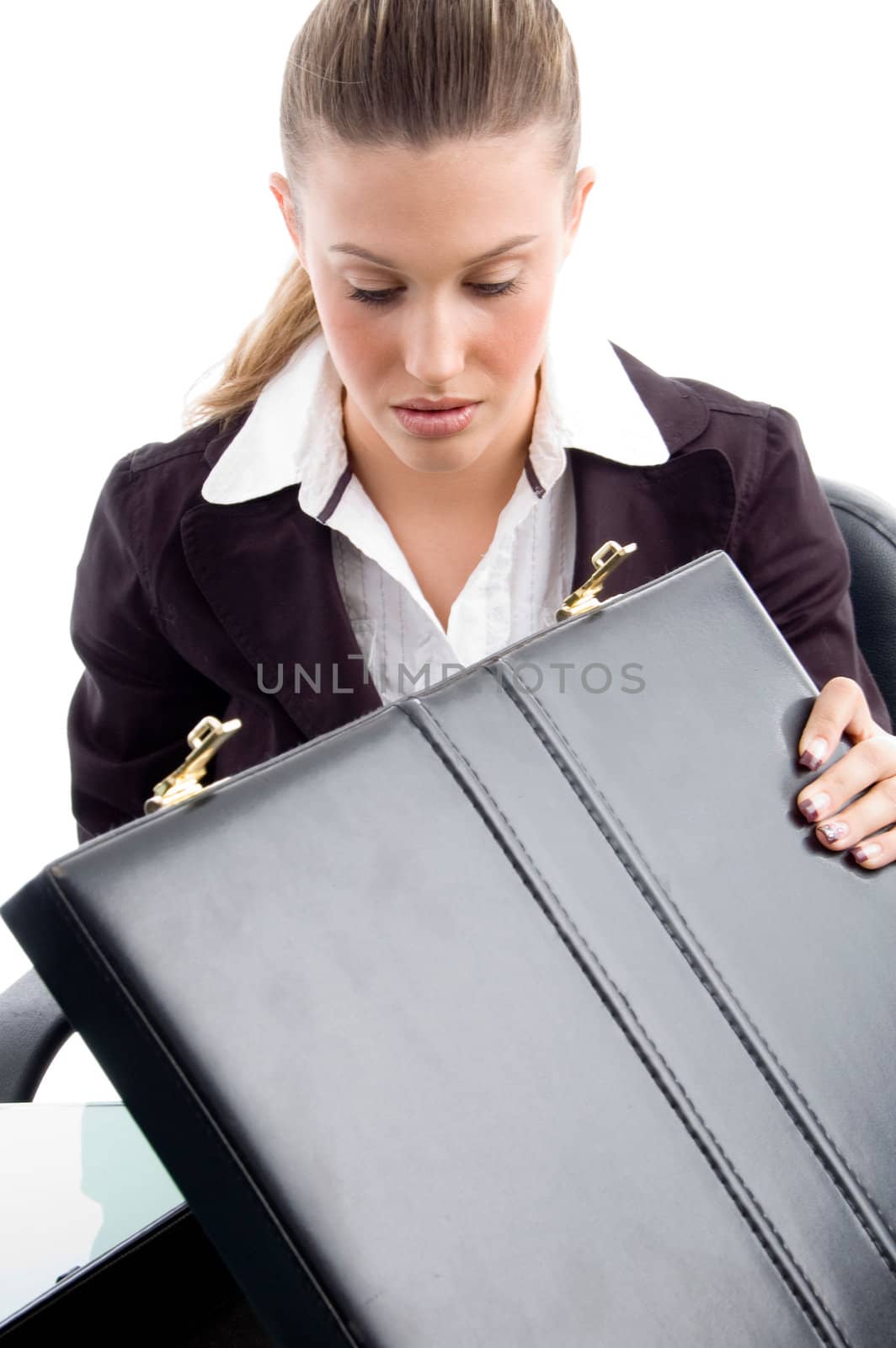woman looking into suitcase with white background