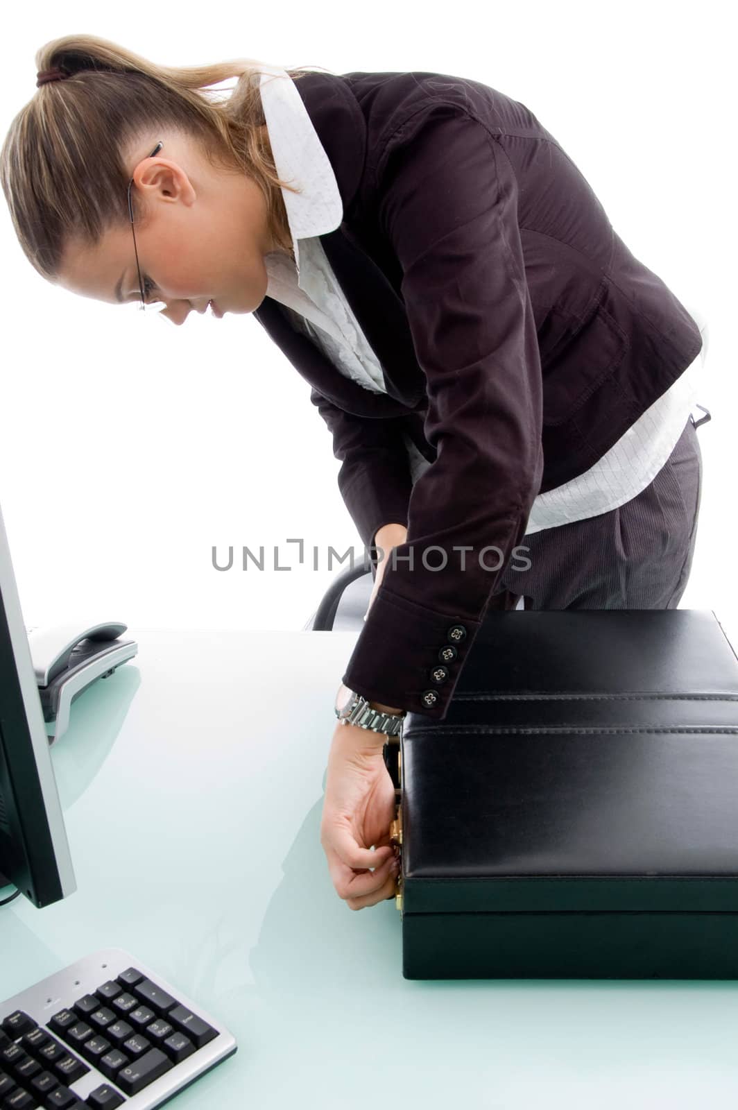 woman closing the briefcase on an isolated white background