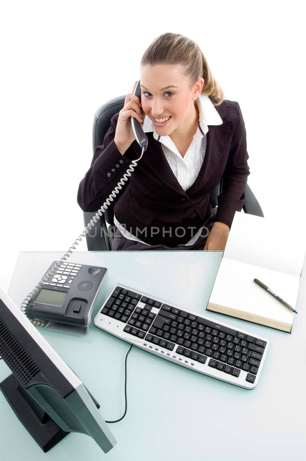 young executive talking on phone on an isolated background