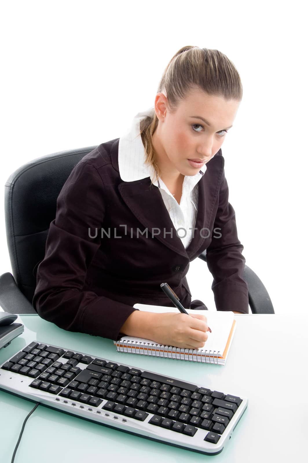 blonde professional writing on notebook against white background