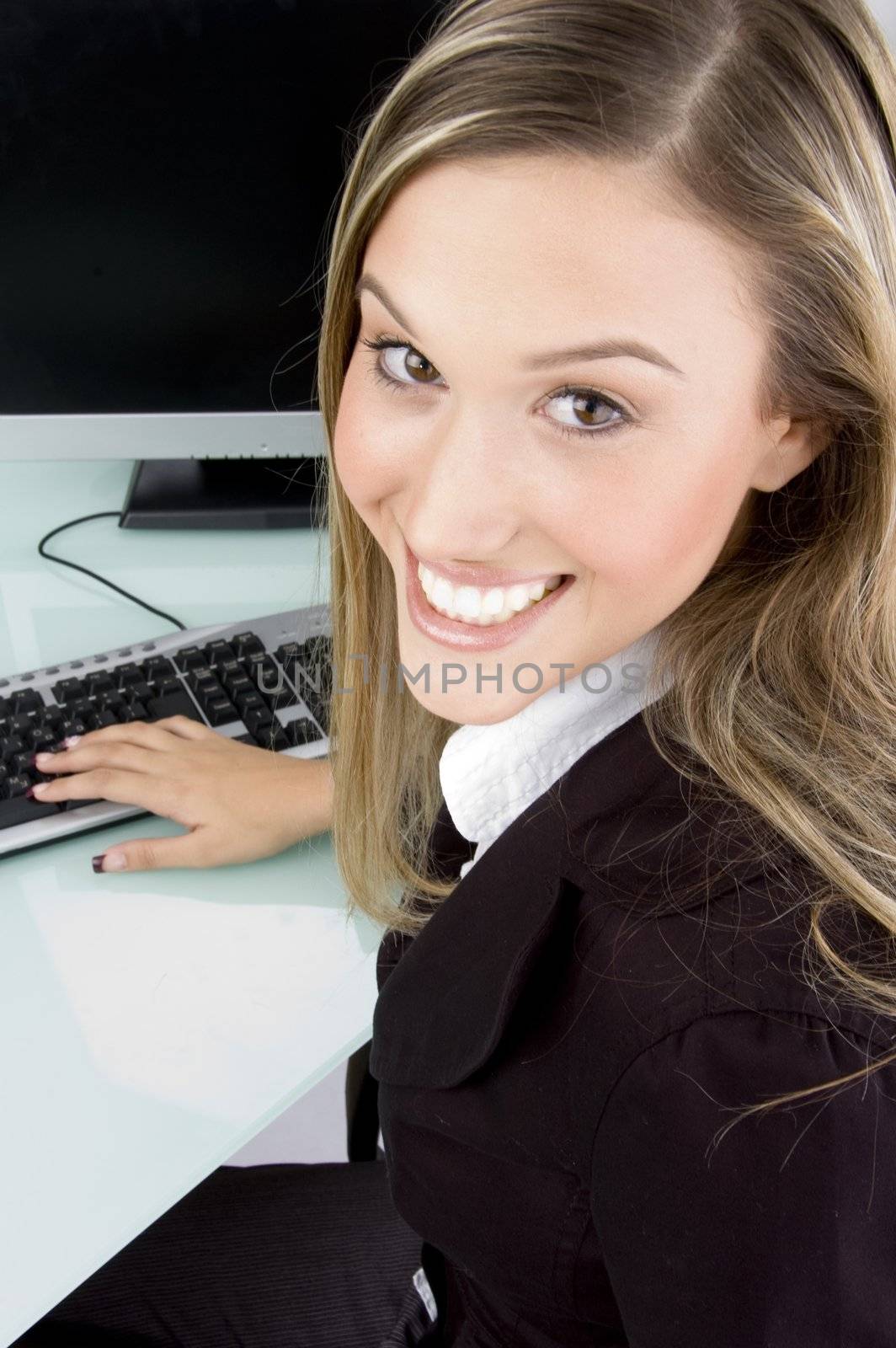 smiling woman looking at camera on an isolated background