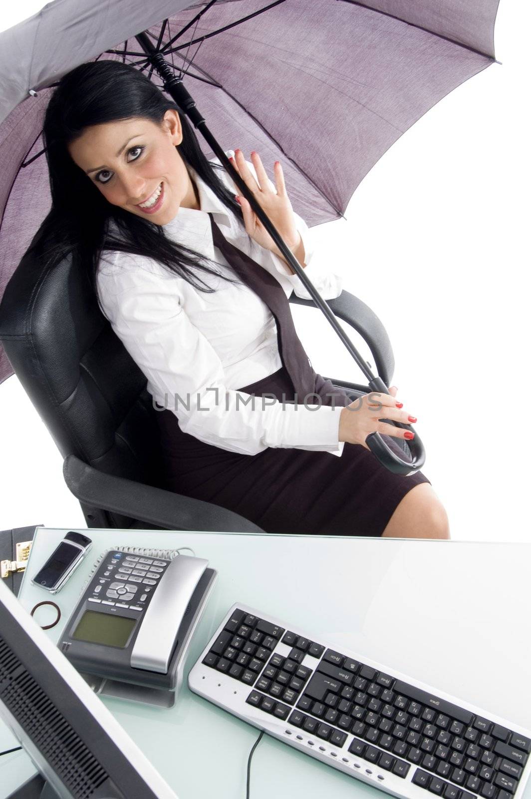 young woman with umbrella and computer by imagerymajestic