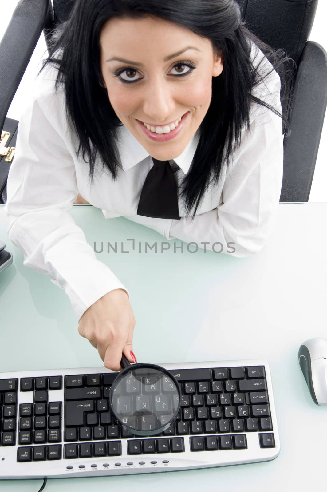 young manager with magnifier on an isolated background