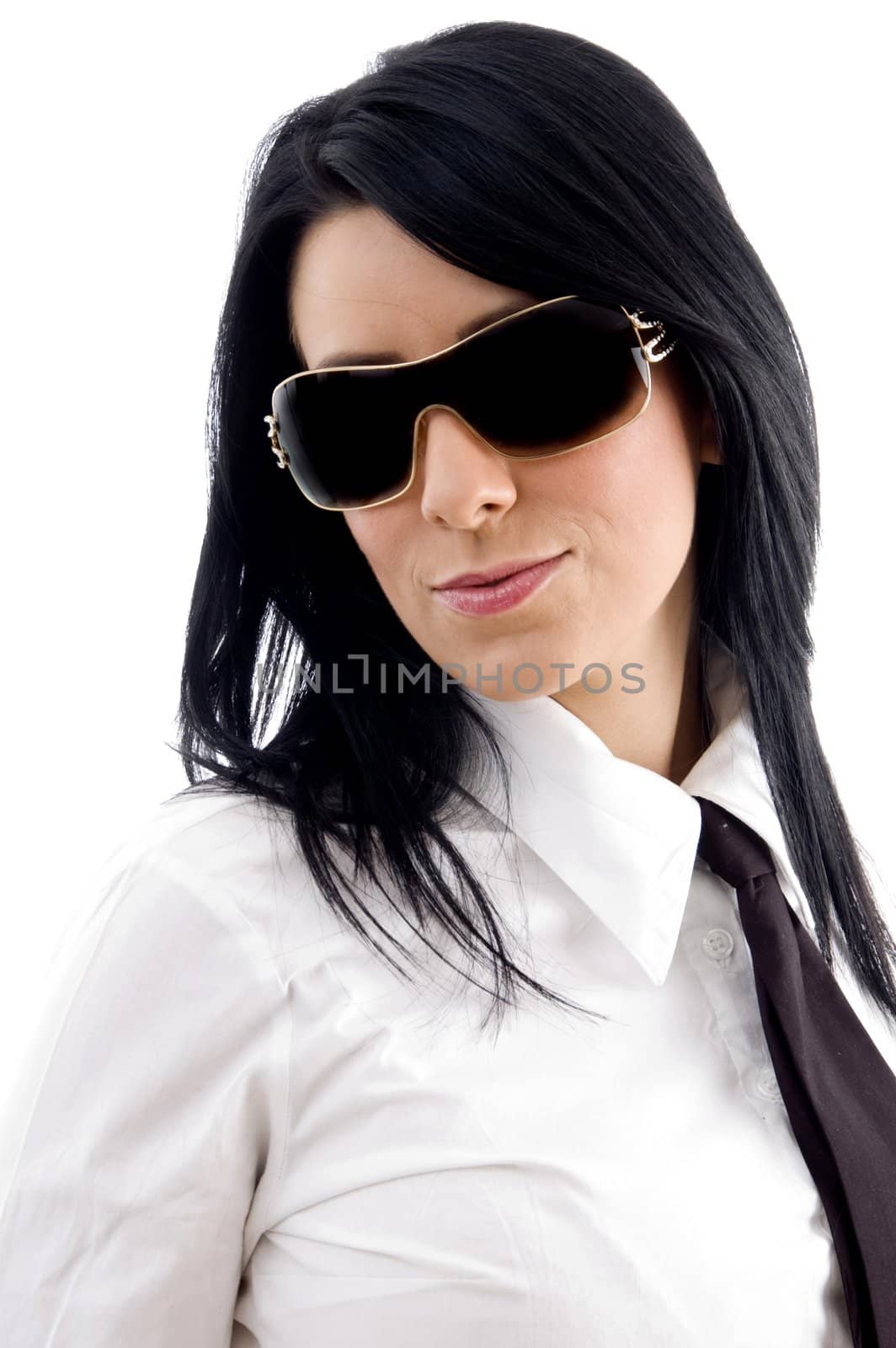 young businesswoman wearing sunglasses on an isolated background