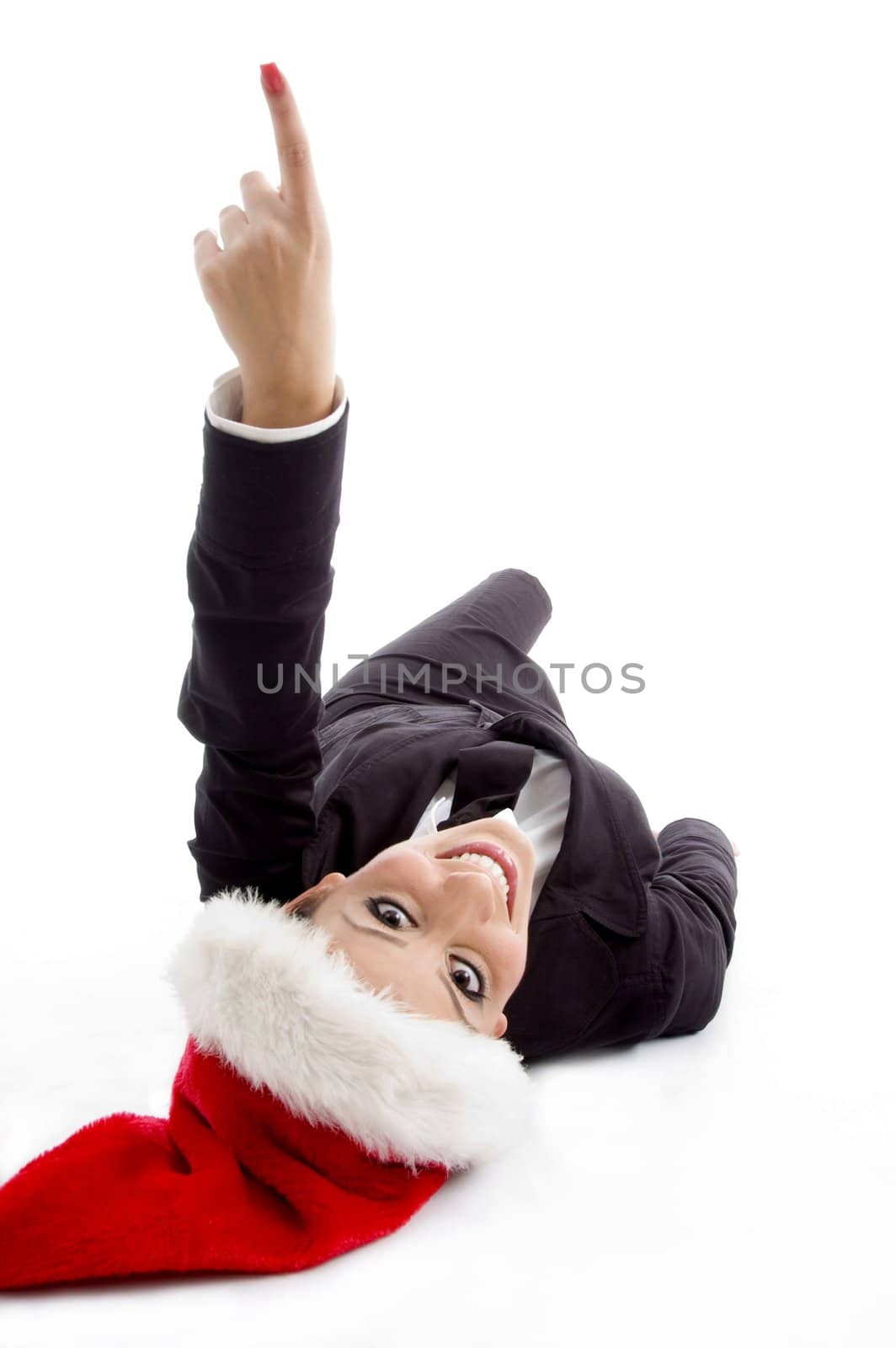 executive with christmas hat pointing upward on an isolated background