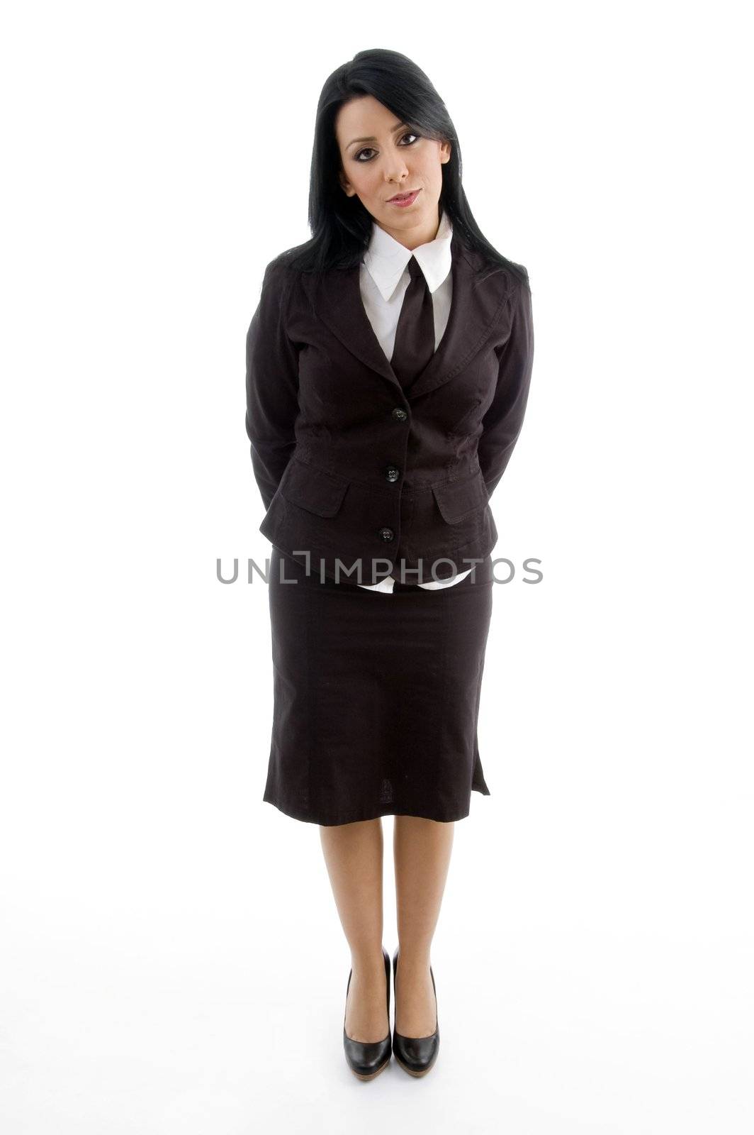 young businesswoman standing against white background