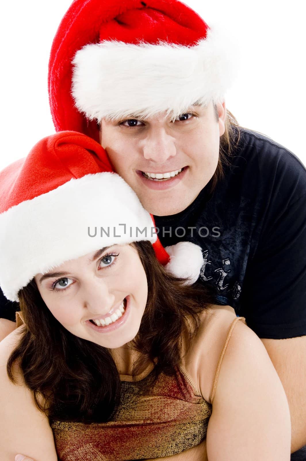 close view of young couple with christmas hat on an isolated white background