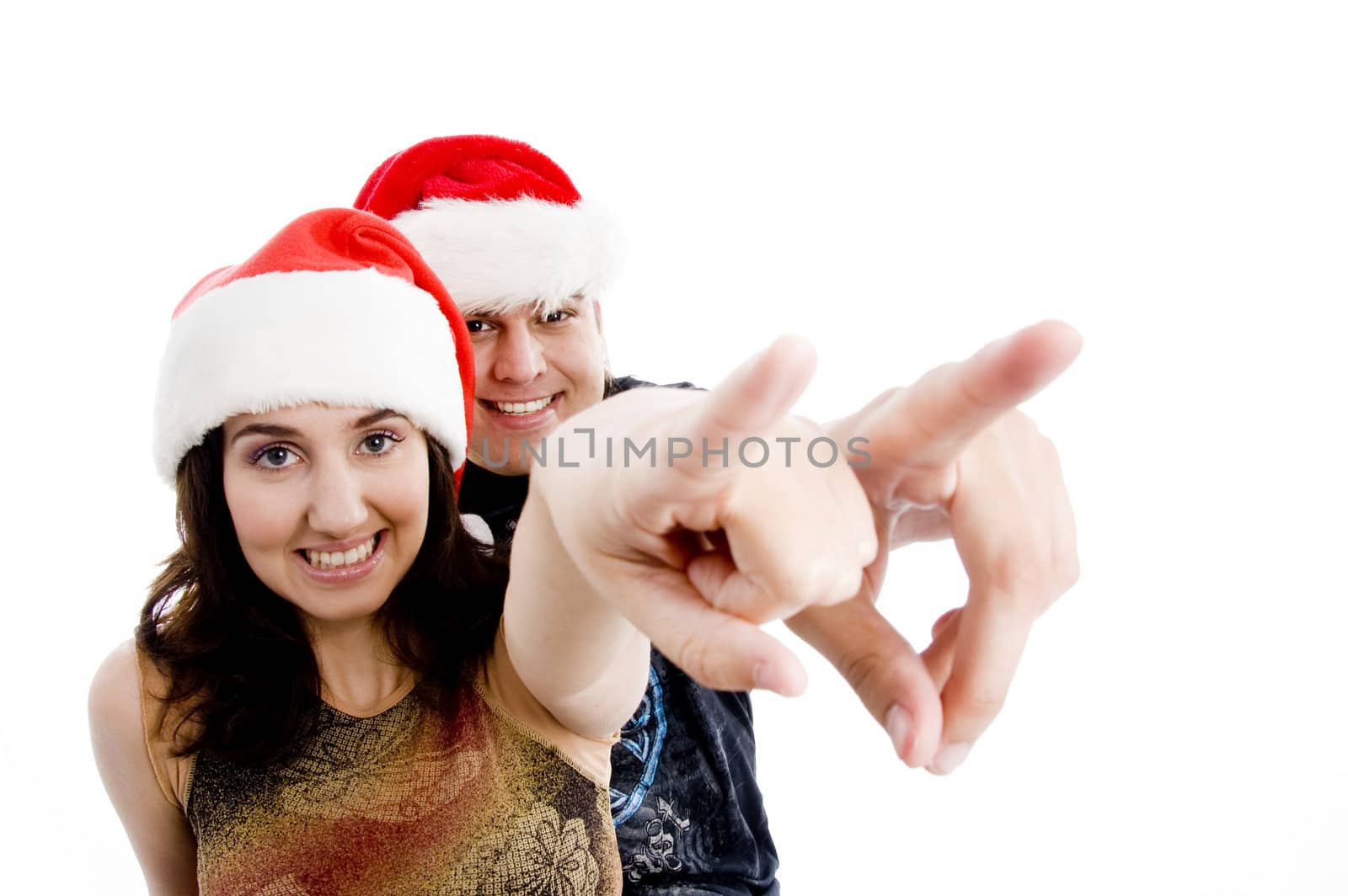 portrait of pointing couple with christmas hat with white background