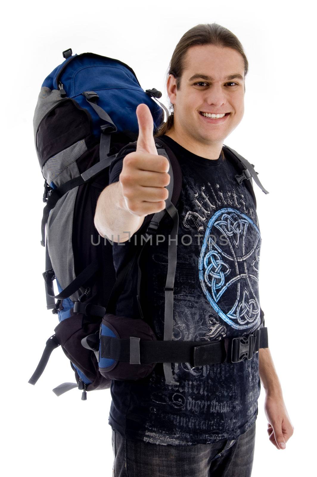traveler with rucksack and thumbs up on an isolated white background