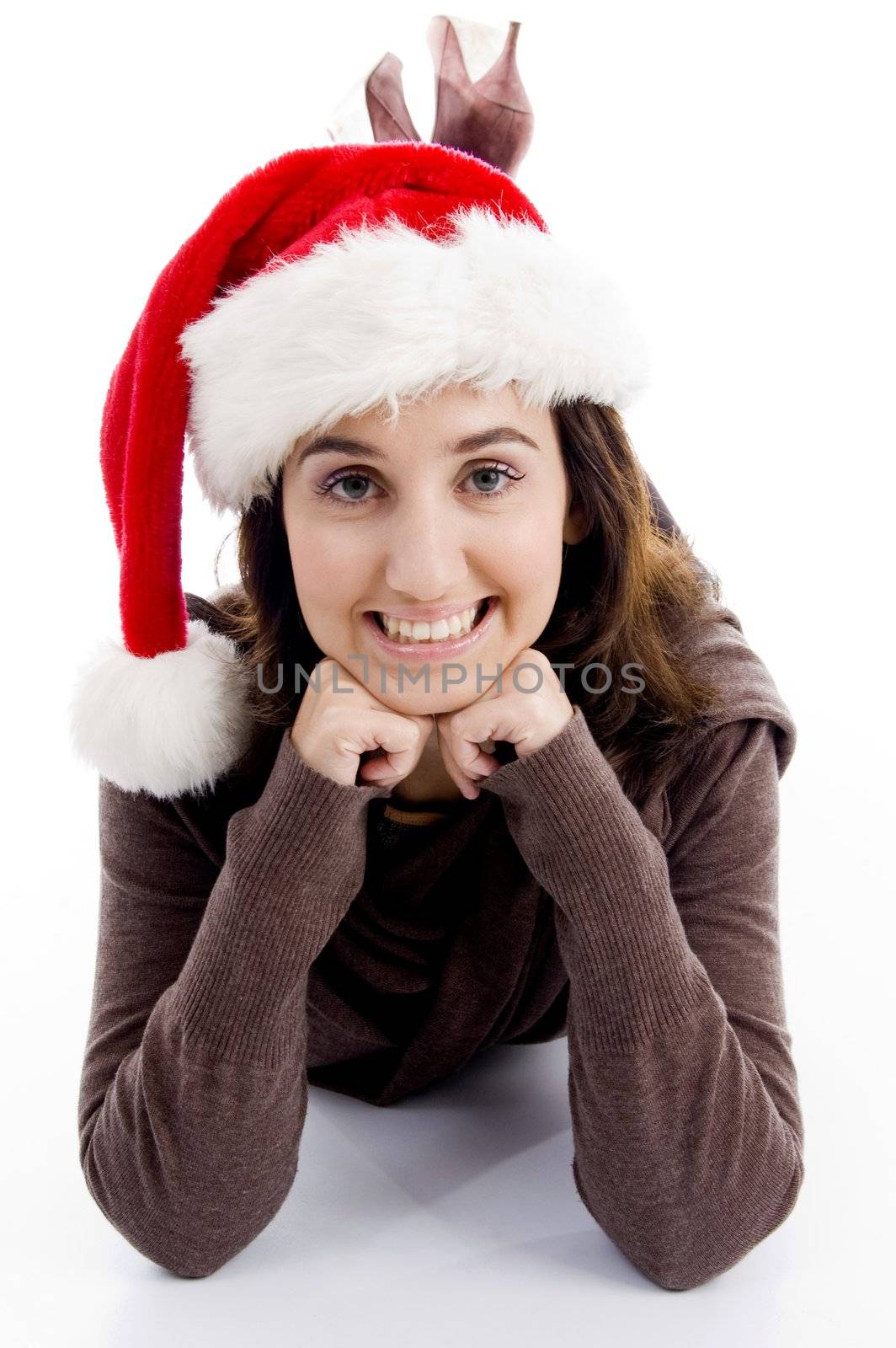 young female in christmas hat posing with white background