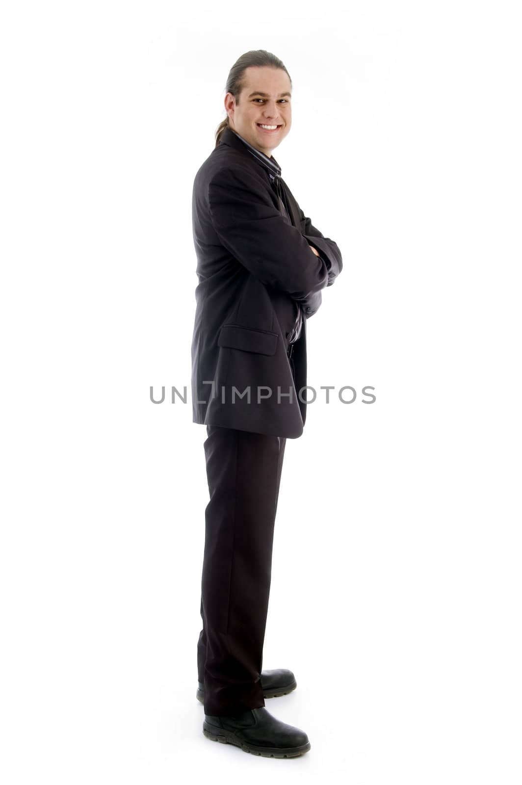 handsome corporate posing and looking at camera against white background