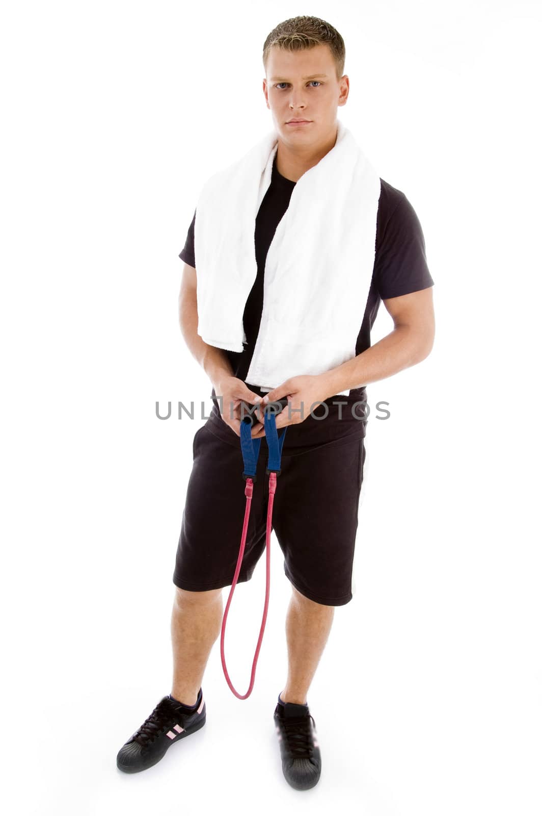 fitness man posing with stretching rope with white background
