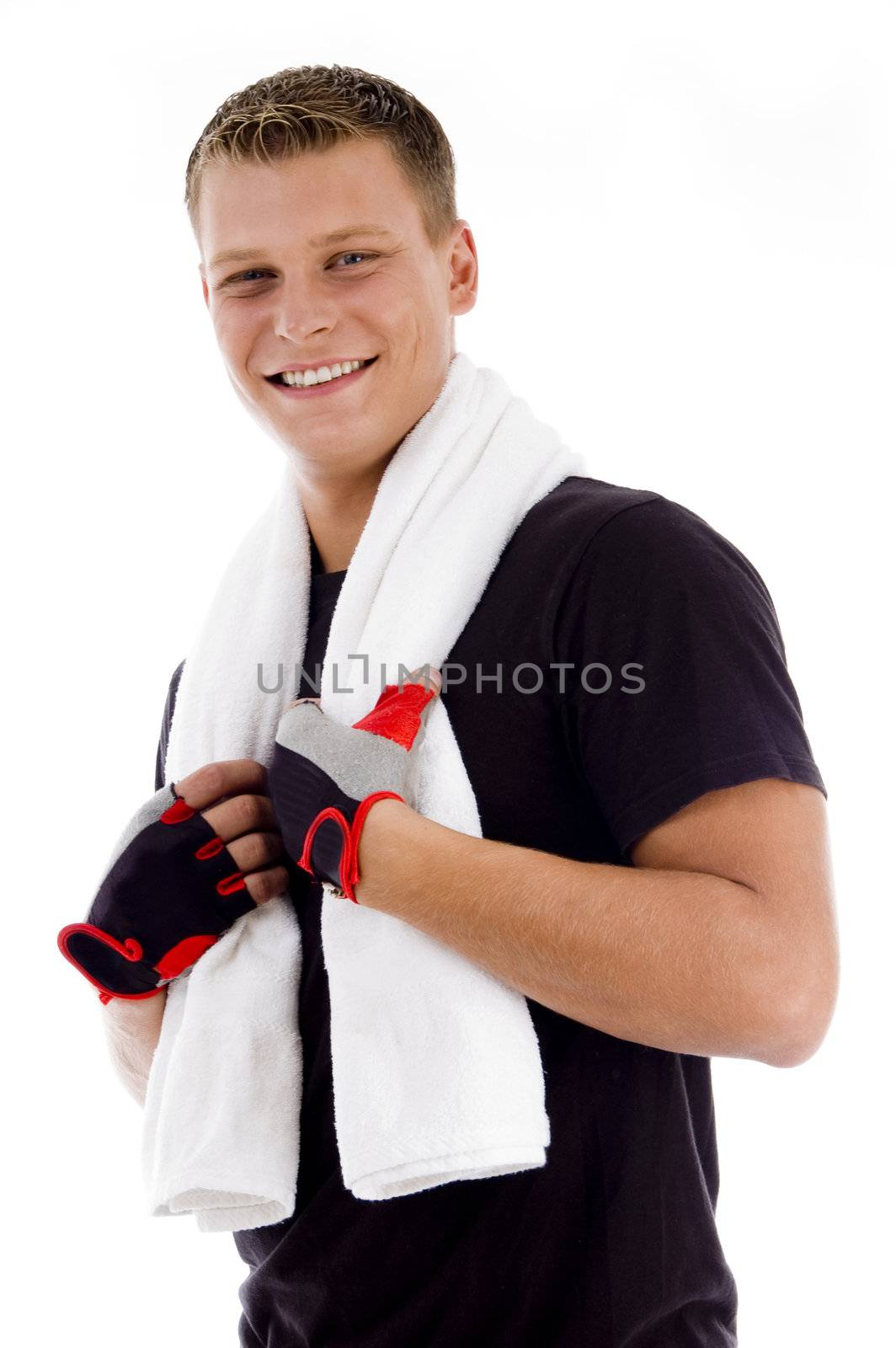 smiling adult man holding towel by imagerymajestic