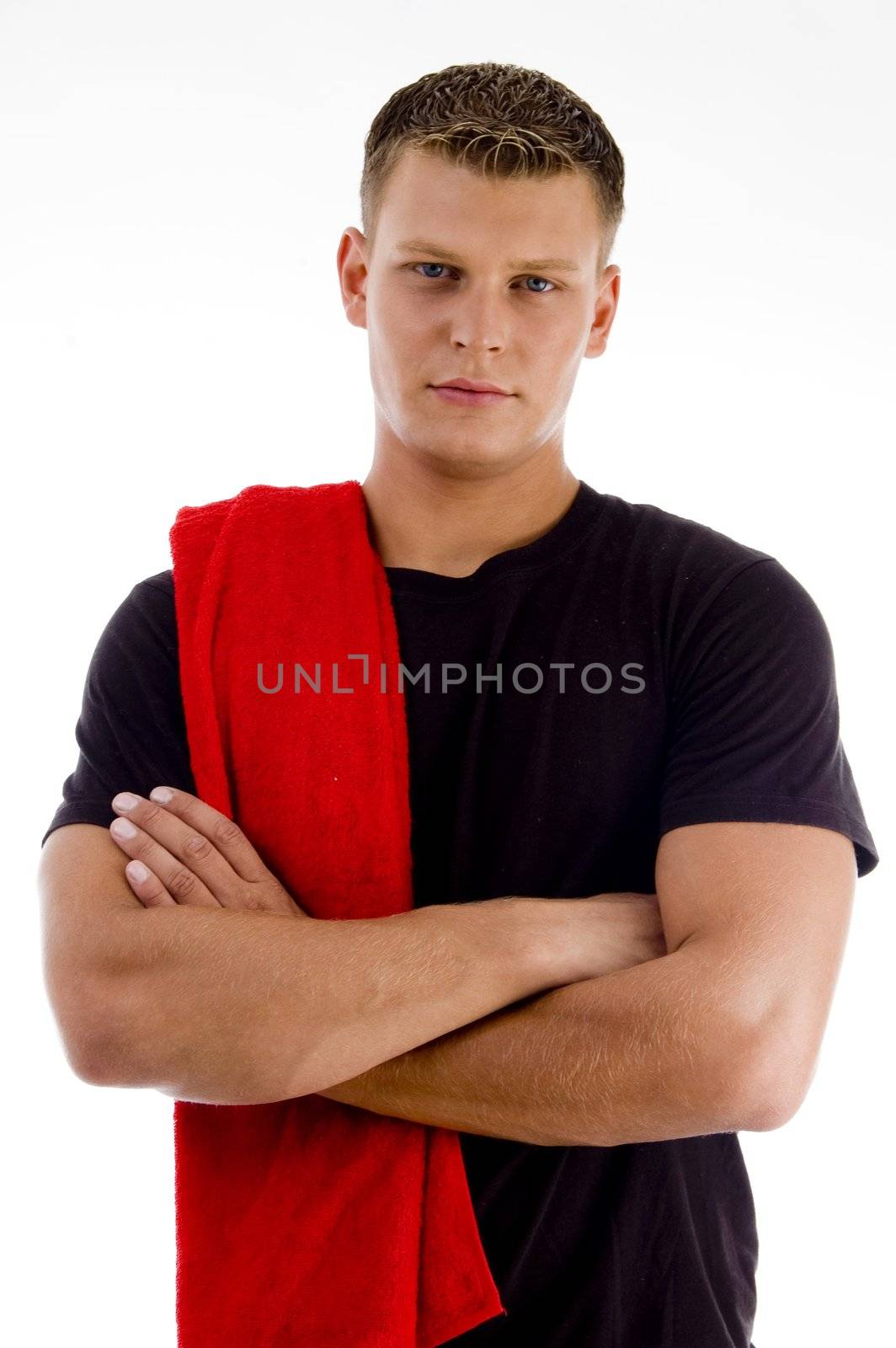 handsome man with towel looking at camera on an isolated white background