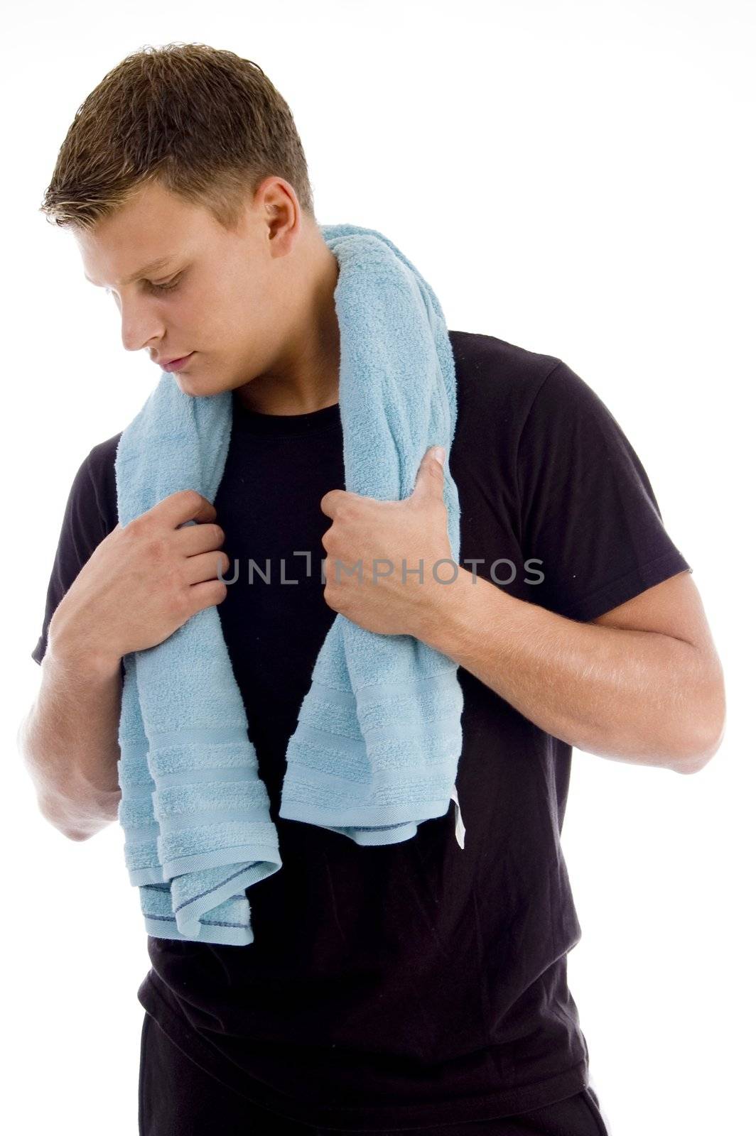 handsome male holding towel on an isolated white background