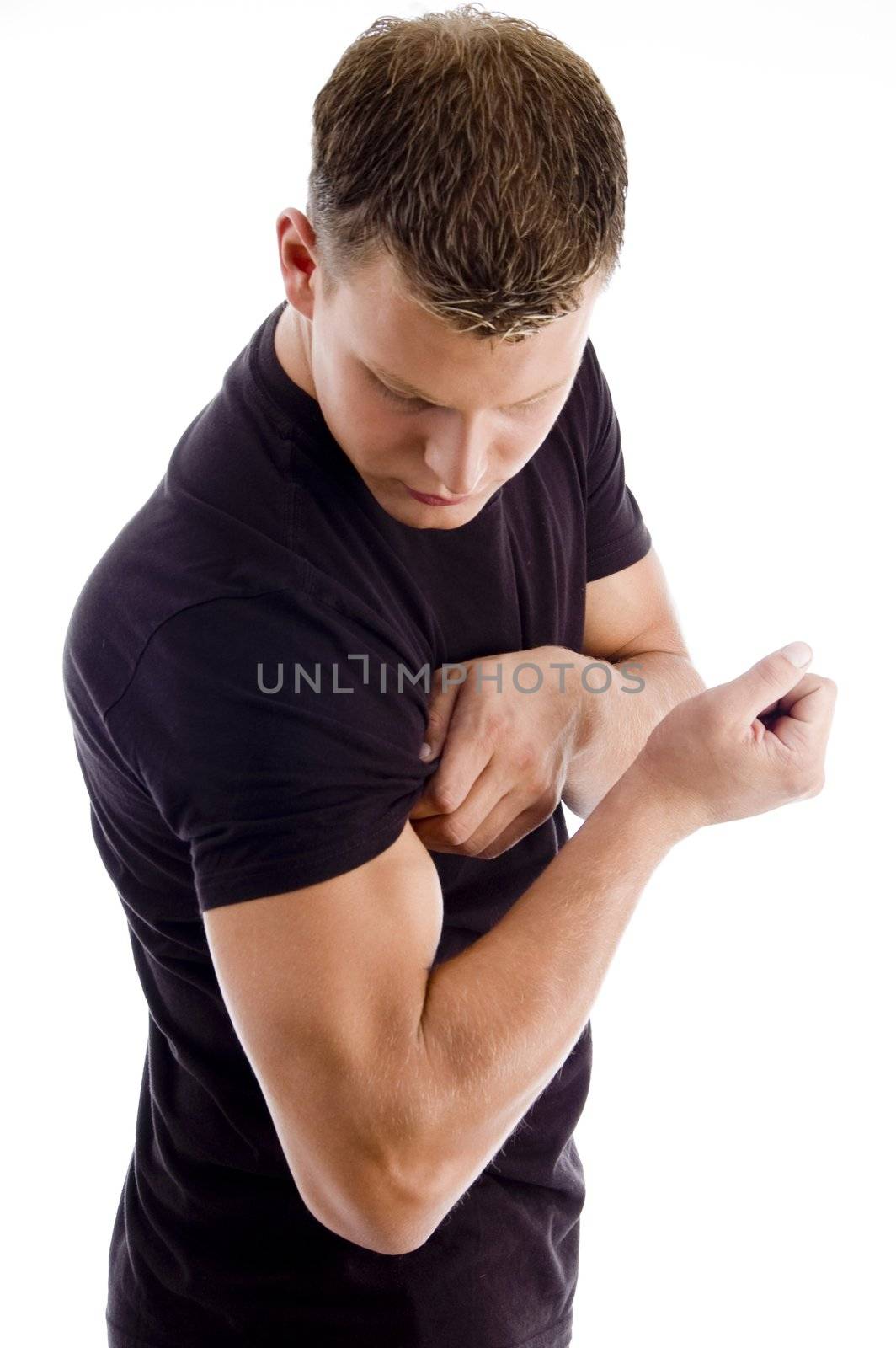 muscular man showing his muscles on an isolated background