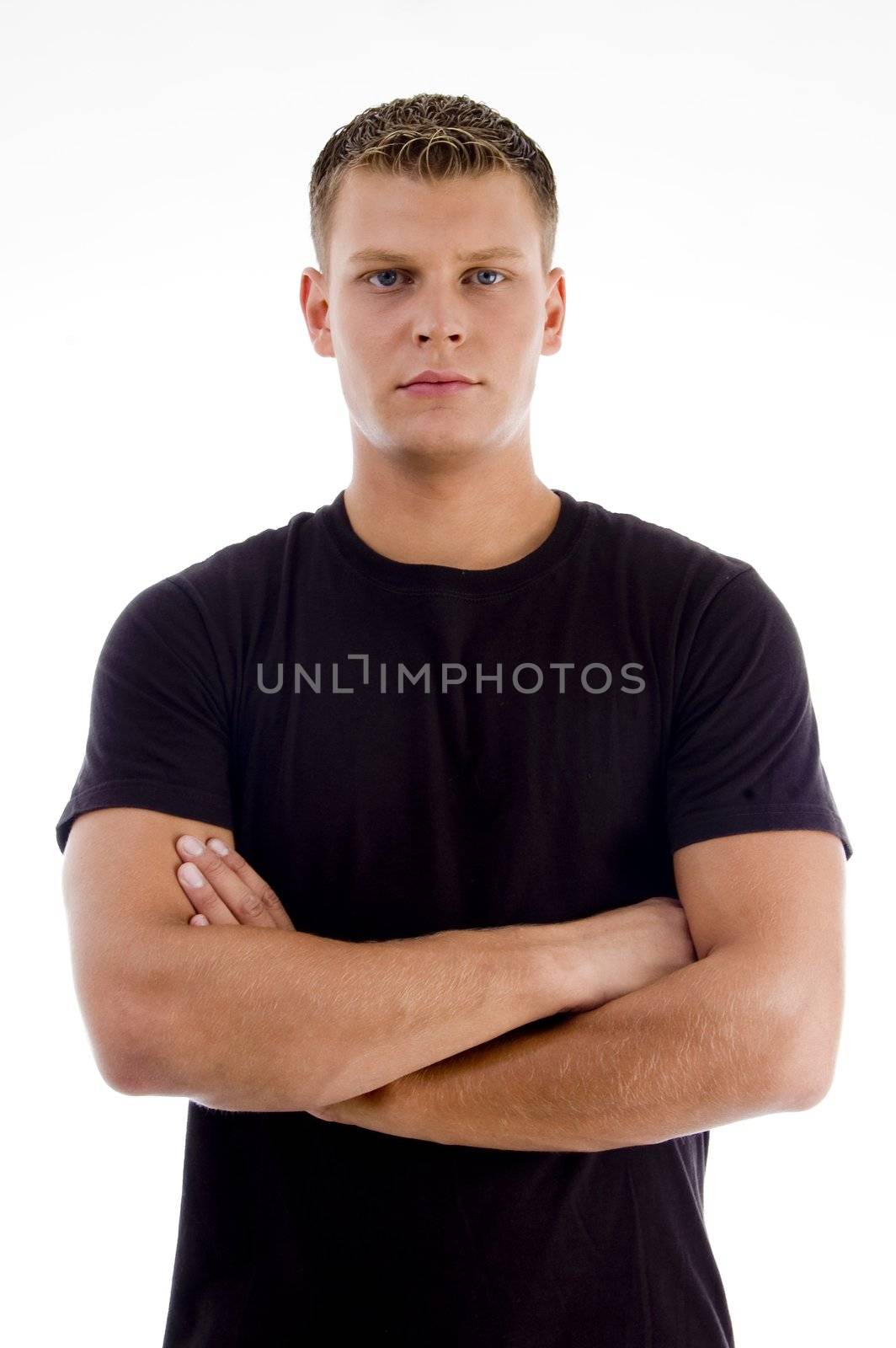 handsome male with crossed arms on an isolated background