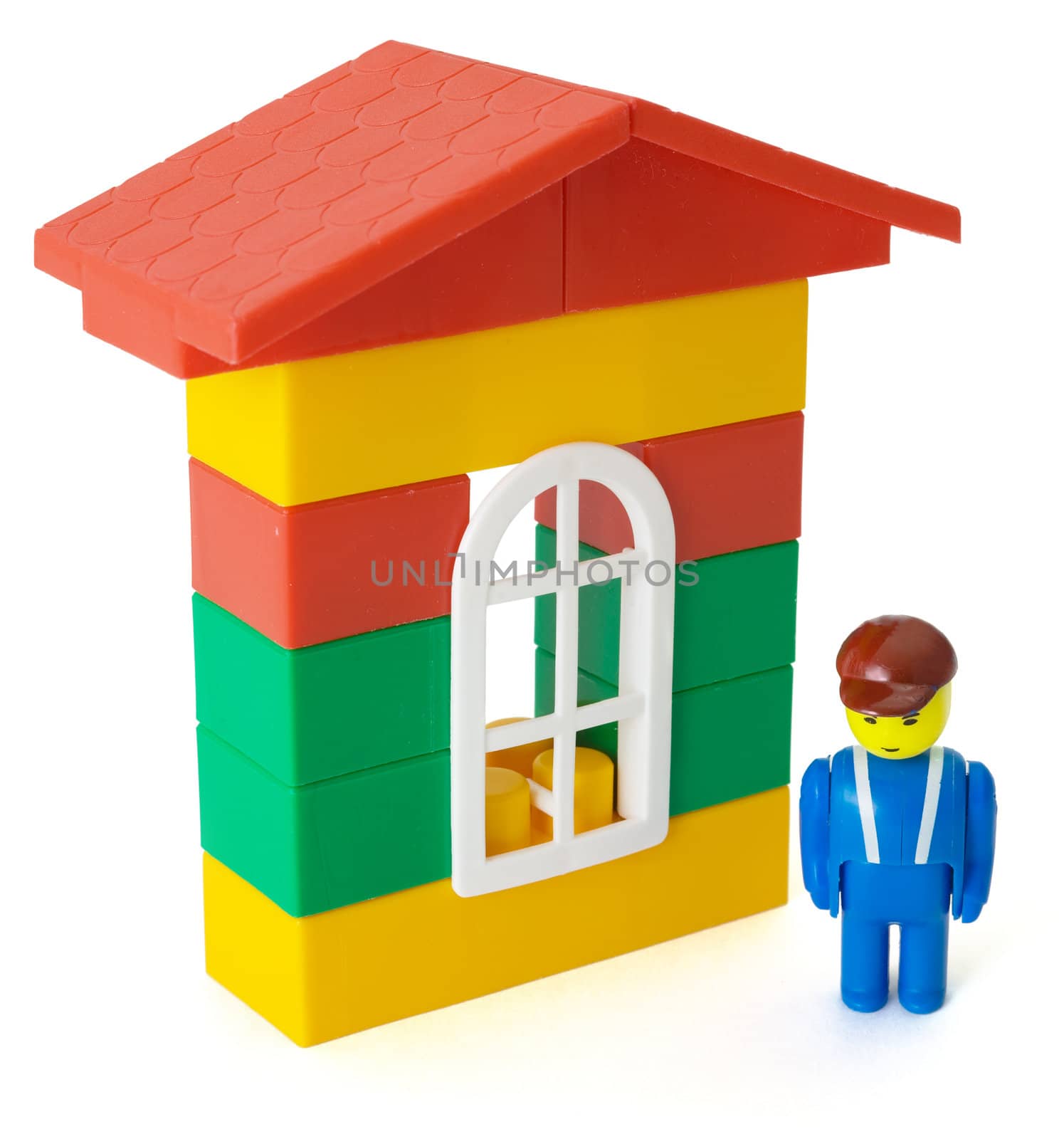 Toy plastic colored house and toy little man