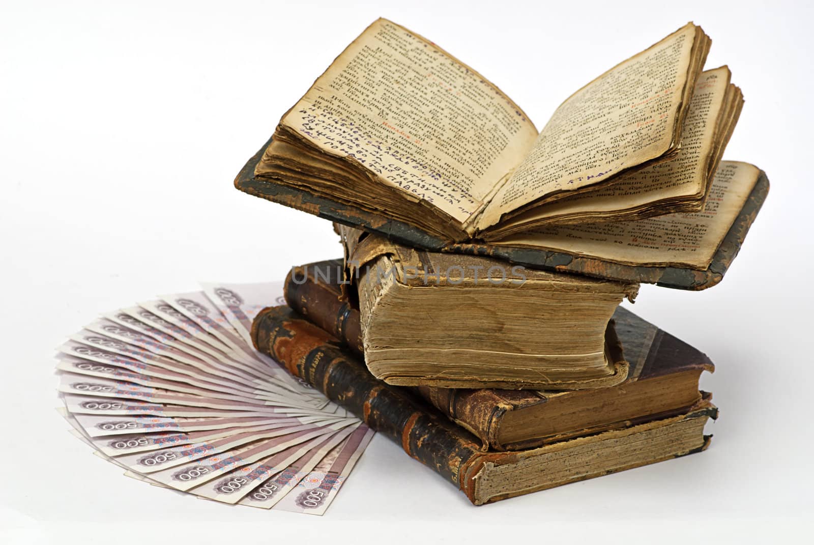 money and old  books isolated