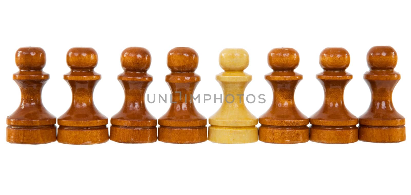 Abreast from wooden dark brown pawns one beige pawn