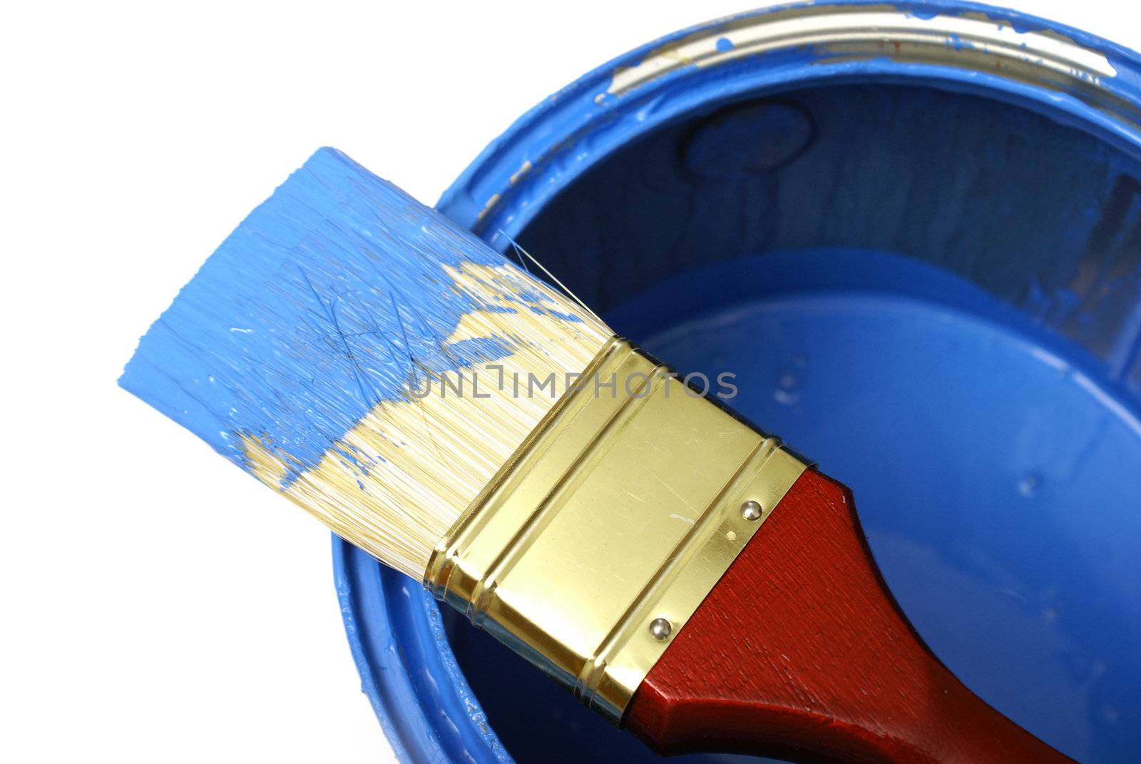 A paint brush and can with the colour blue.