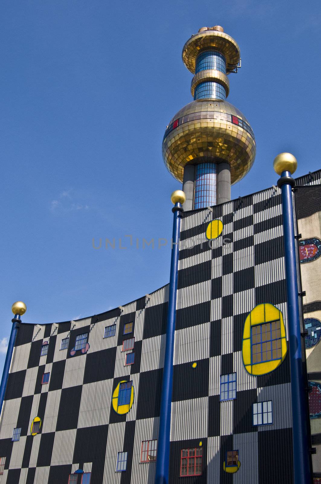 detail of the colorful community heating plant designed by Hundertwasser in Vienna
