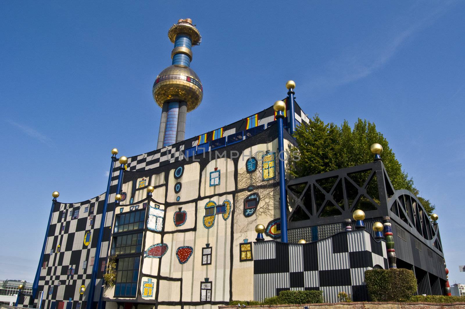 detail of the colorful community heating plant designed by Hundertwasser in Vienna