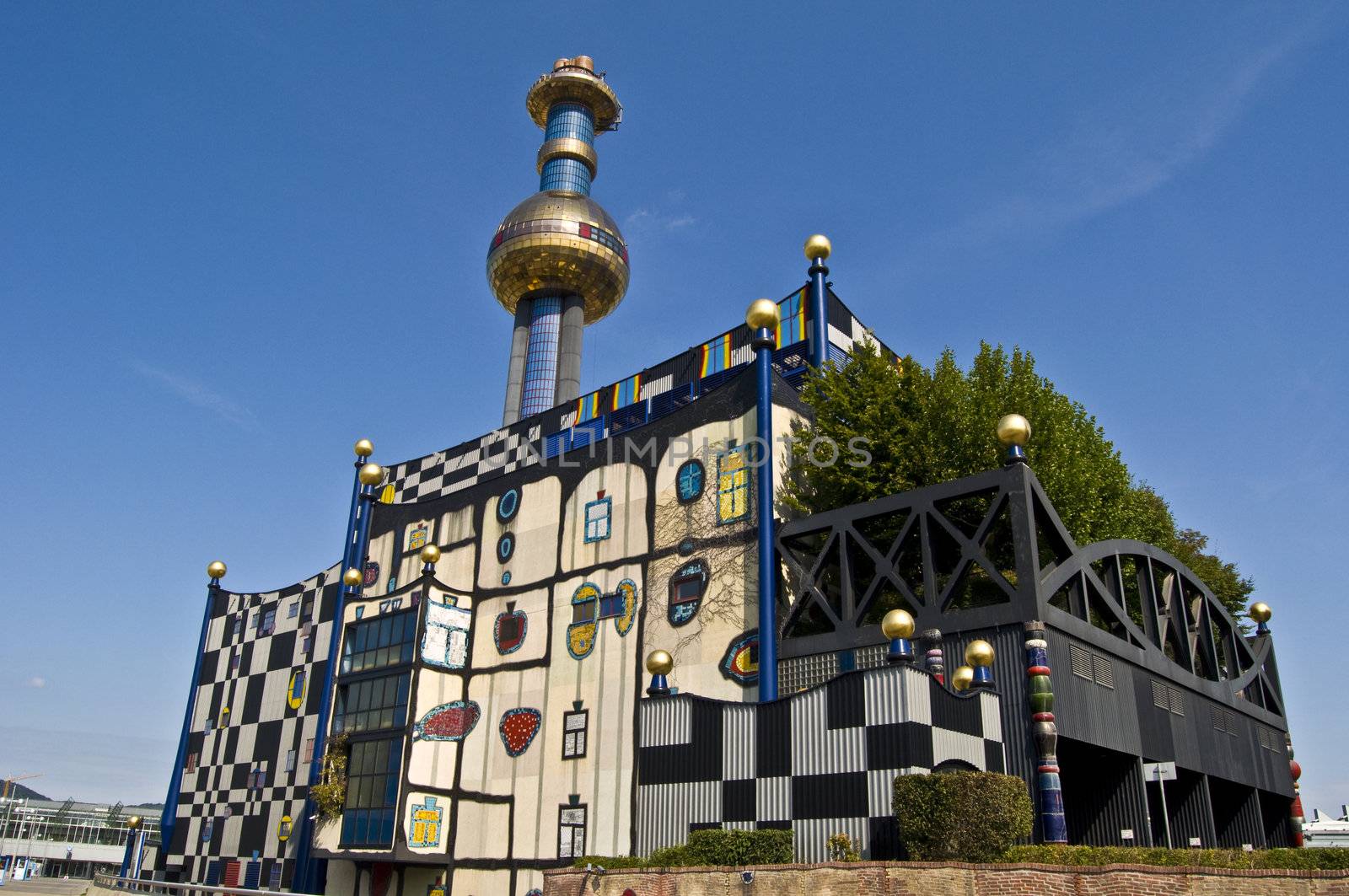detail of the colorful community heating plant designed by Hundertwasser in Vienna