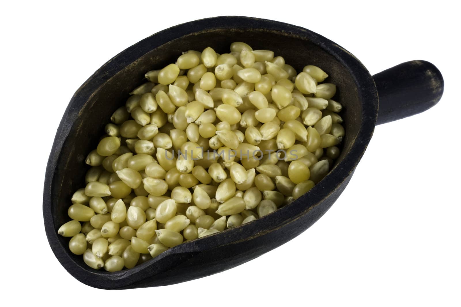 scoop of corn kernels by PixelsAway