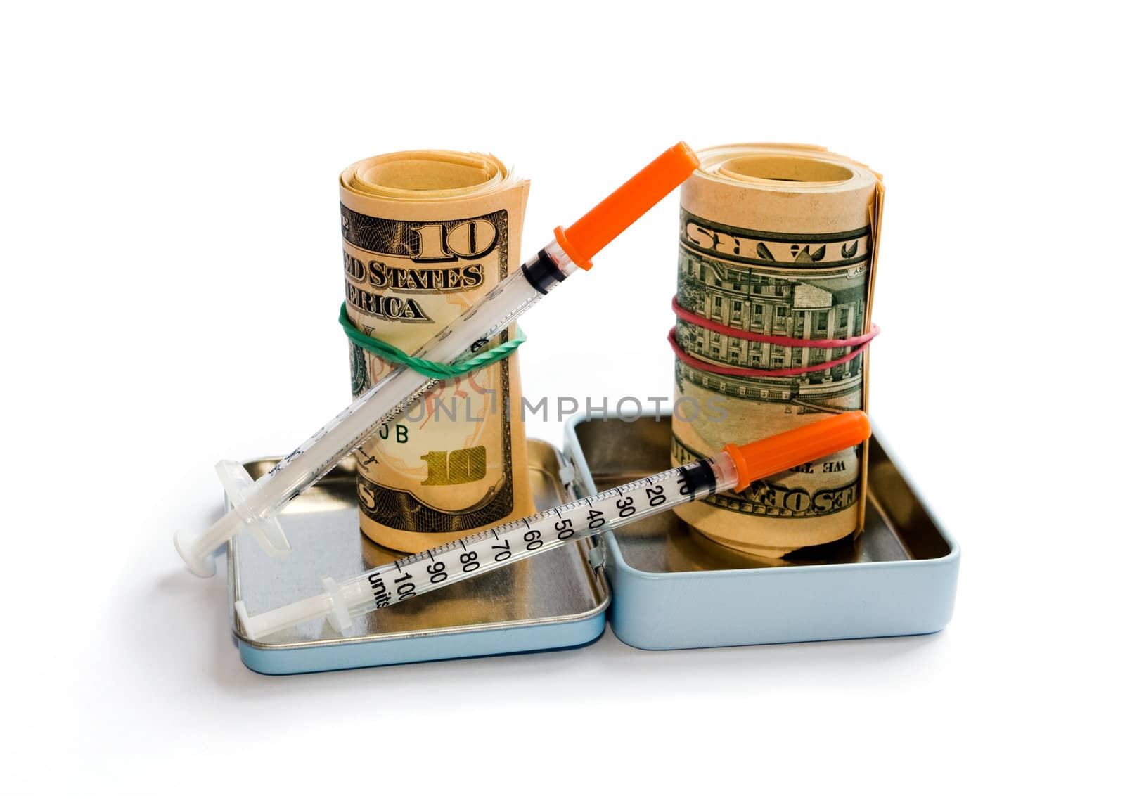 A roll of dollars with syringe isolated on white with clipping path
