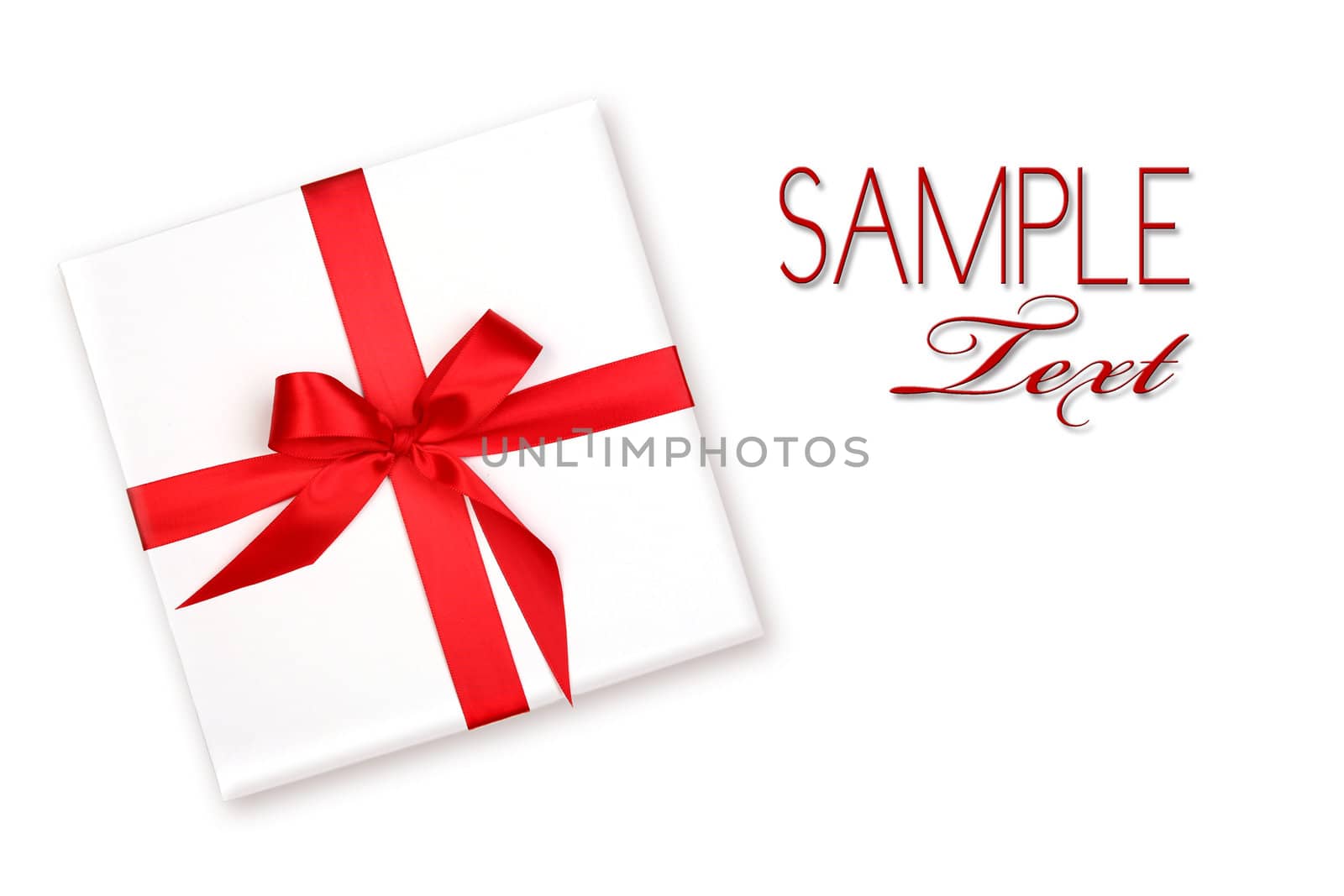Wrapped Holiday Gift With Red Ribbon and Bow With Copyspace For Your Design