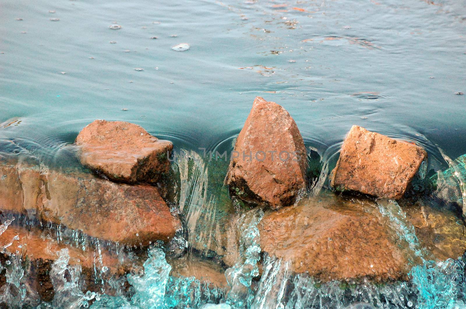 Red rocks blue water by RefocusPhoto