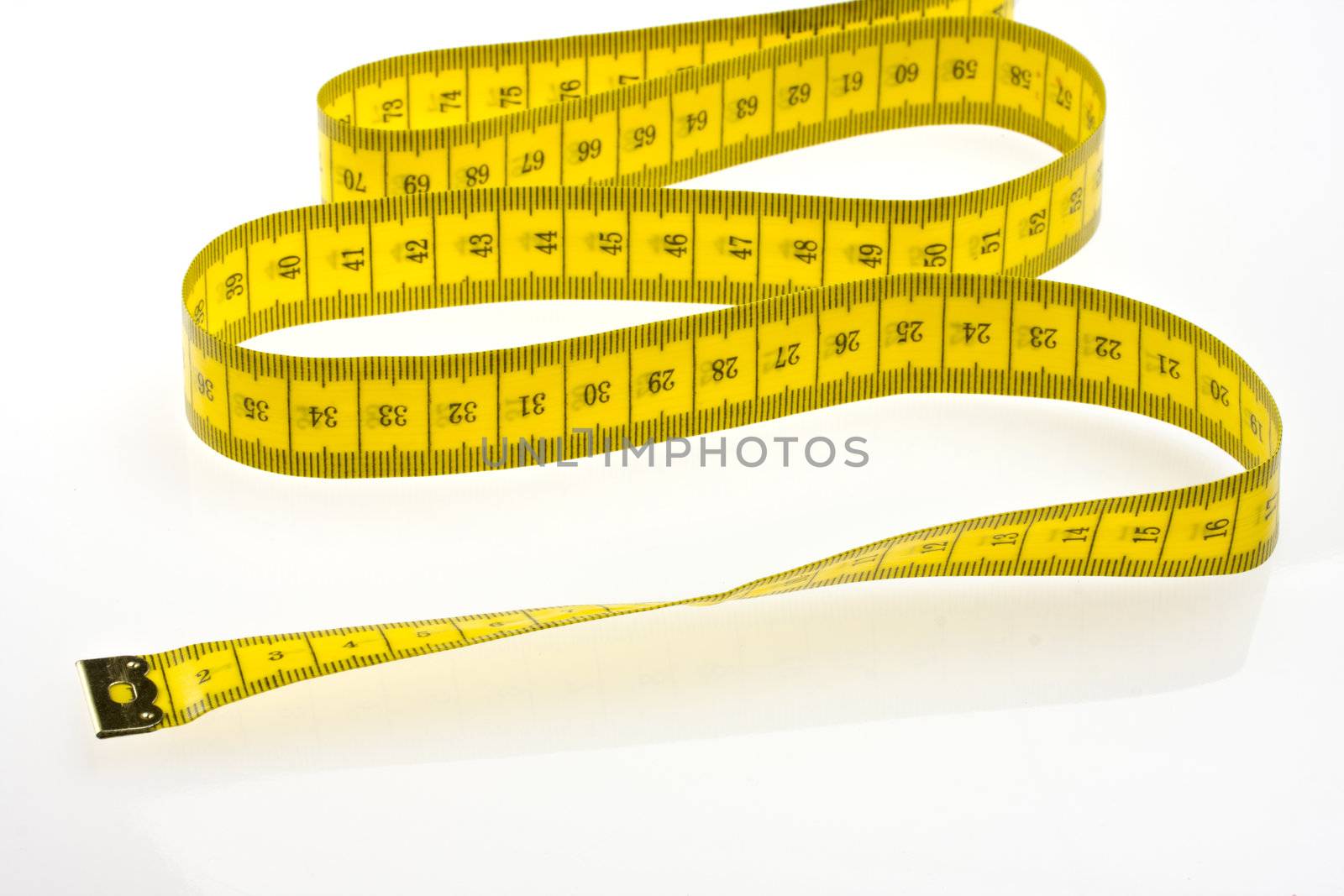 yellow measuring tape isolated on white background