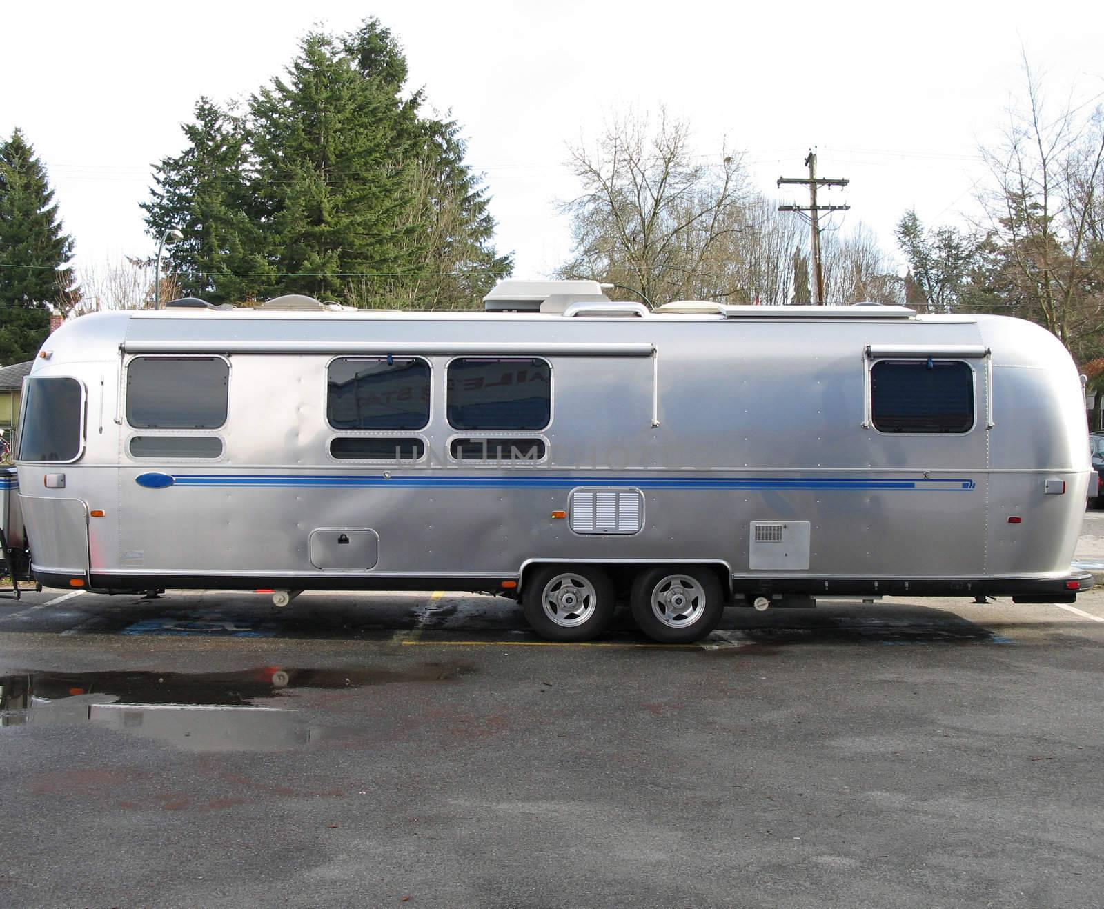 old silver and blue caravan