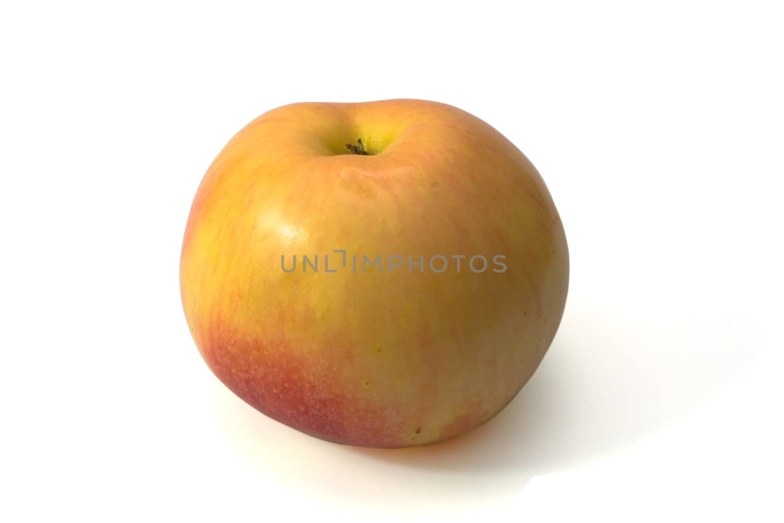 Ripe and tasty apple on a white background